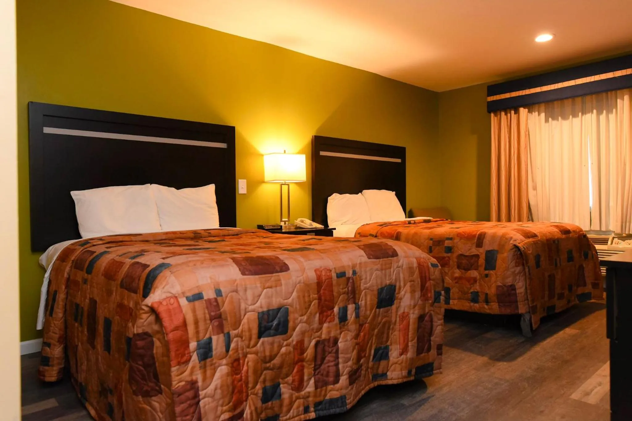 Bed in Capital Inn and Suites