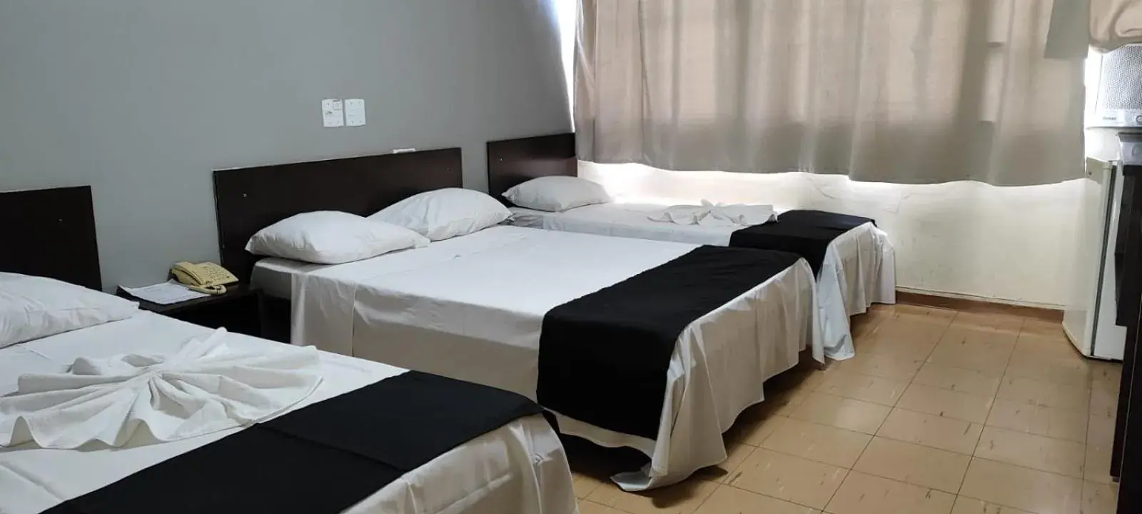 Standard Triple Room - single occupancy in Hotel La Rocca, Goiânia Standard Triple Room - single occupancy in Hotel La Rocca, Goiânia