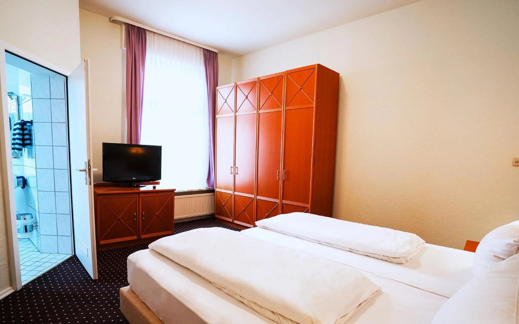 Bed in Trip Inn Parkhotel Bad Ems