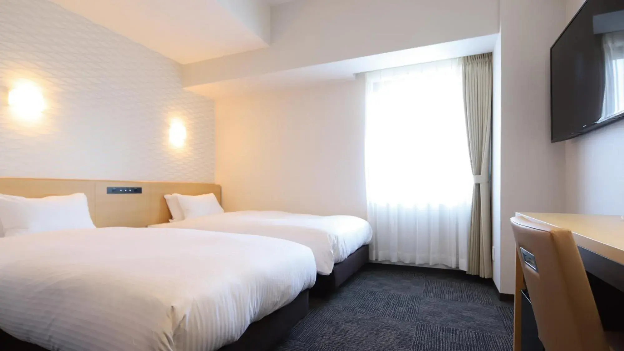 Bed in AB Hotel Konan Bed in AB Hotel Konan