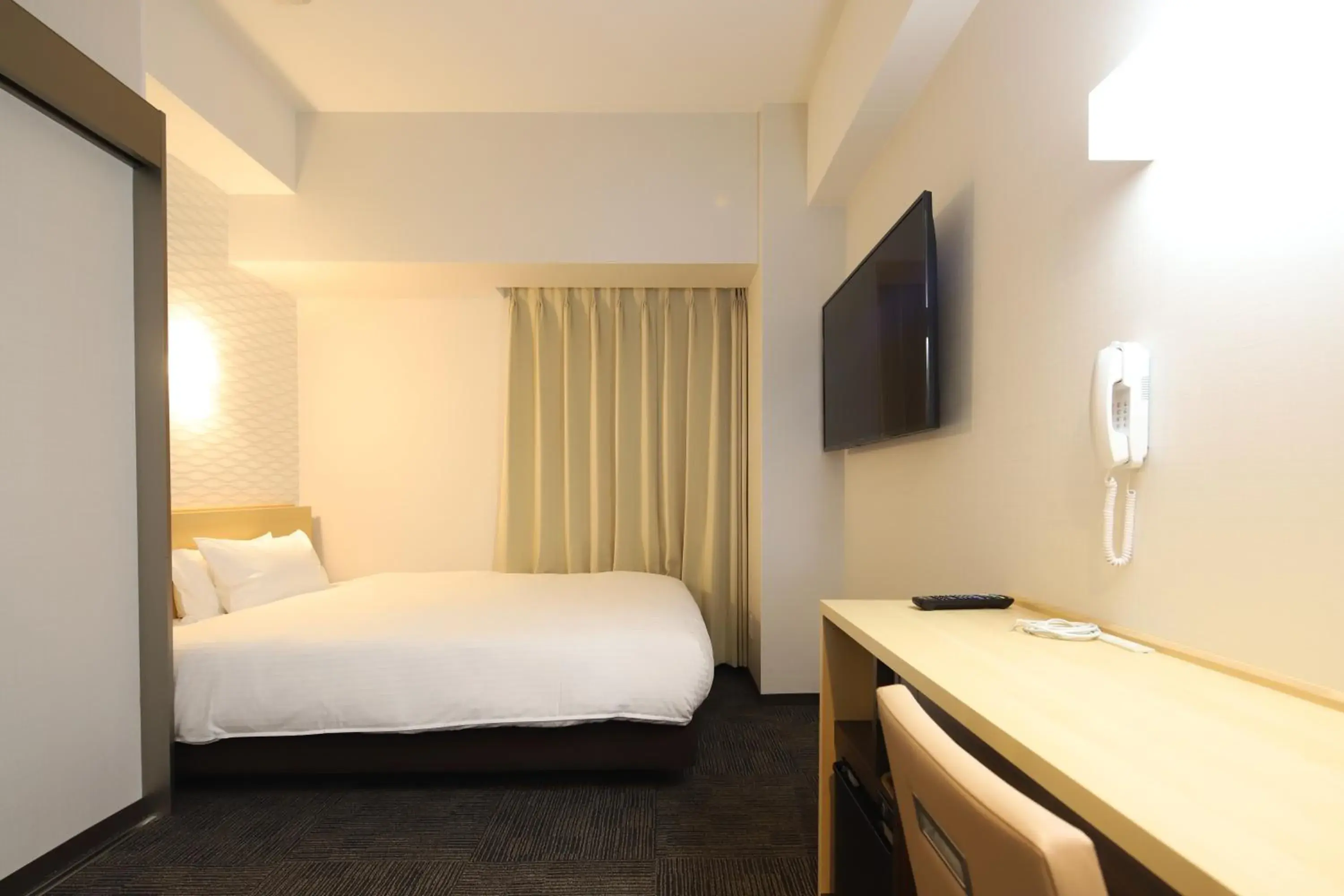 Bed in AB Hotel Konan Bed in AB Hotel Konan