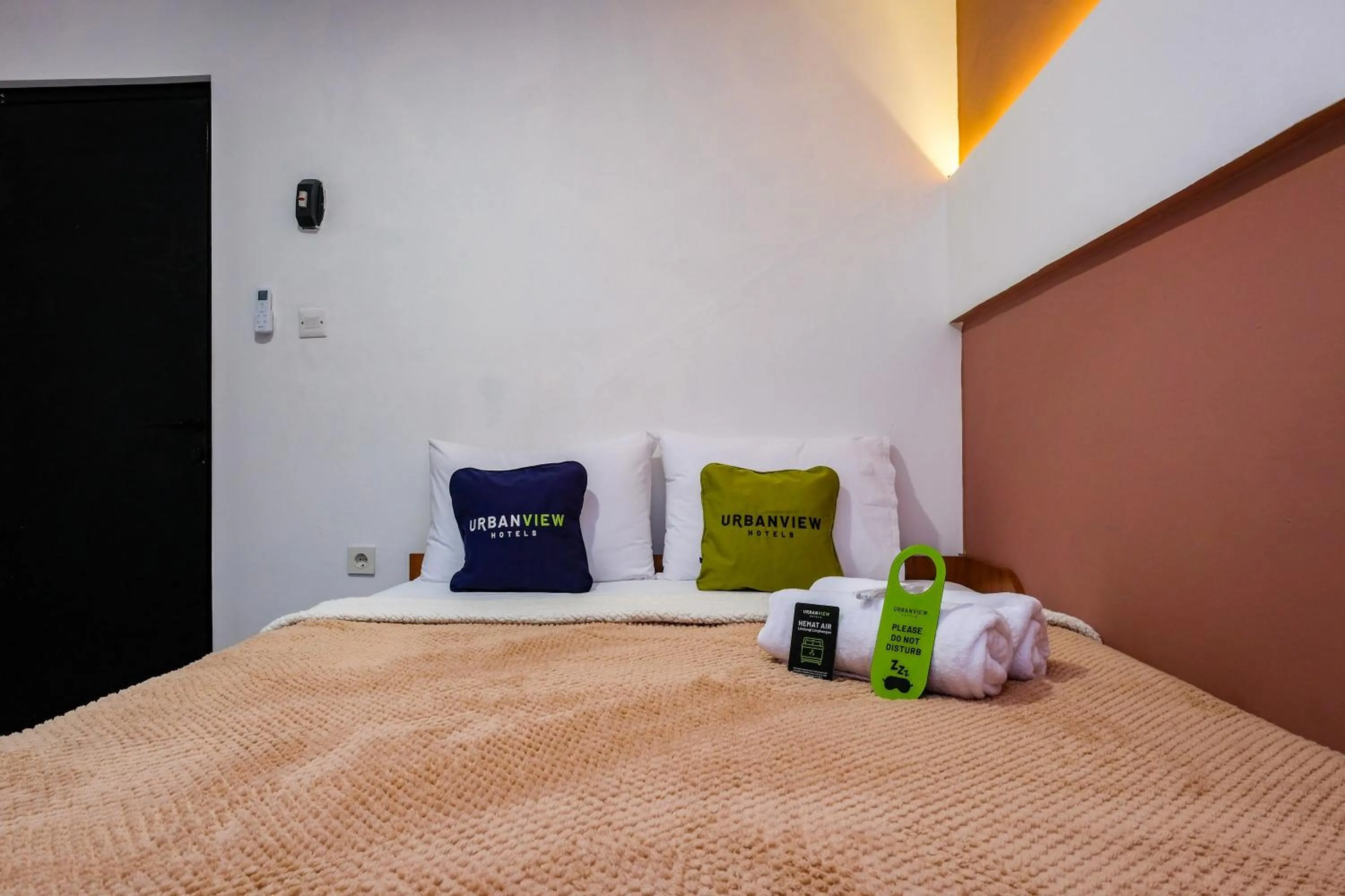 Bed in Urbanview Syariah Soul Sanctuary near Stasiun Purwokerto