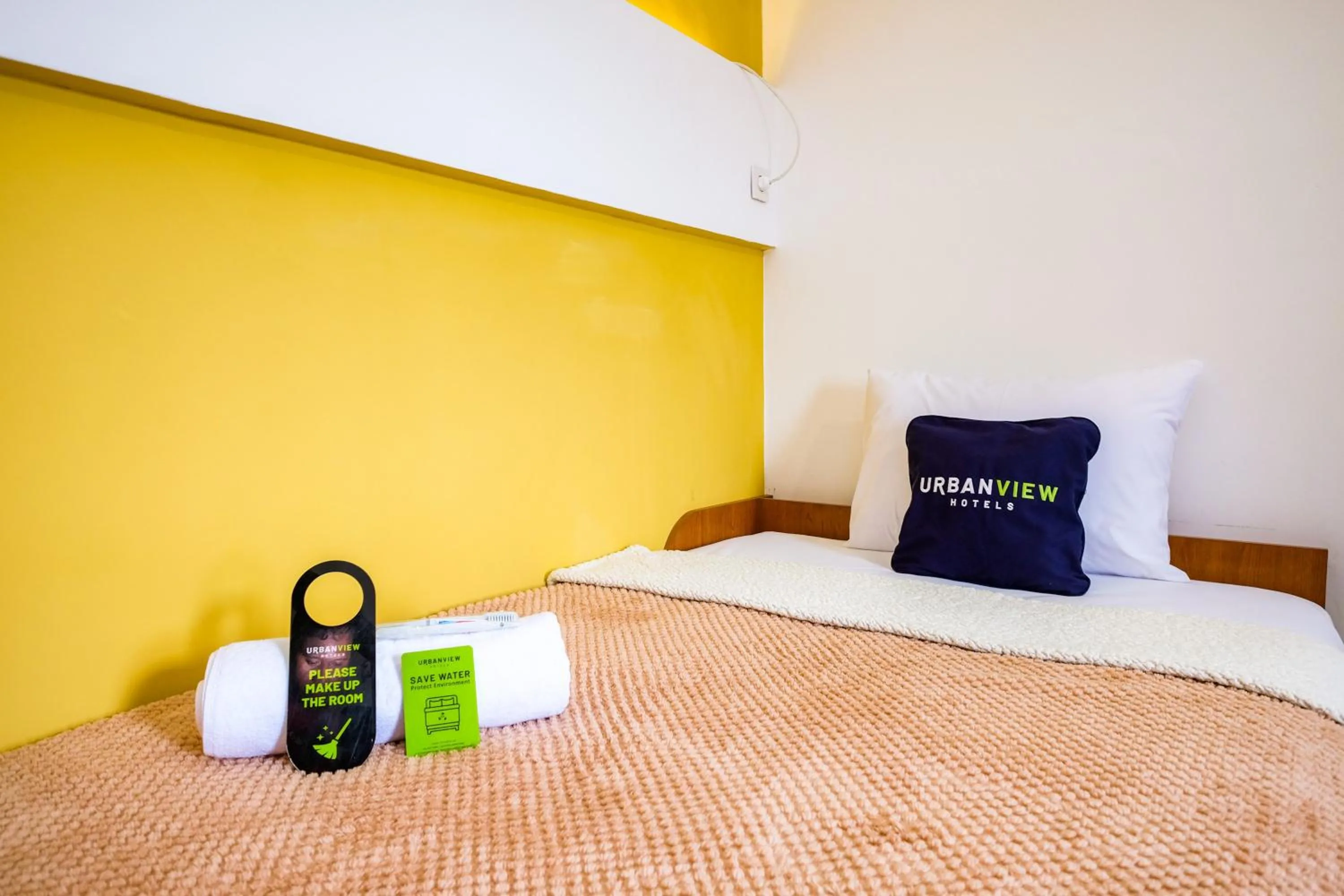 Bed in Urbanview Syariah Soul Sanctuary near Stasiun Purwokerto