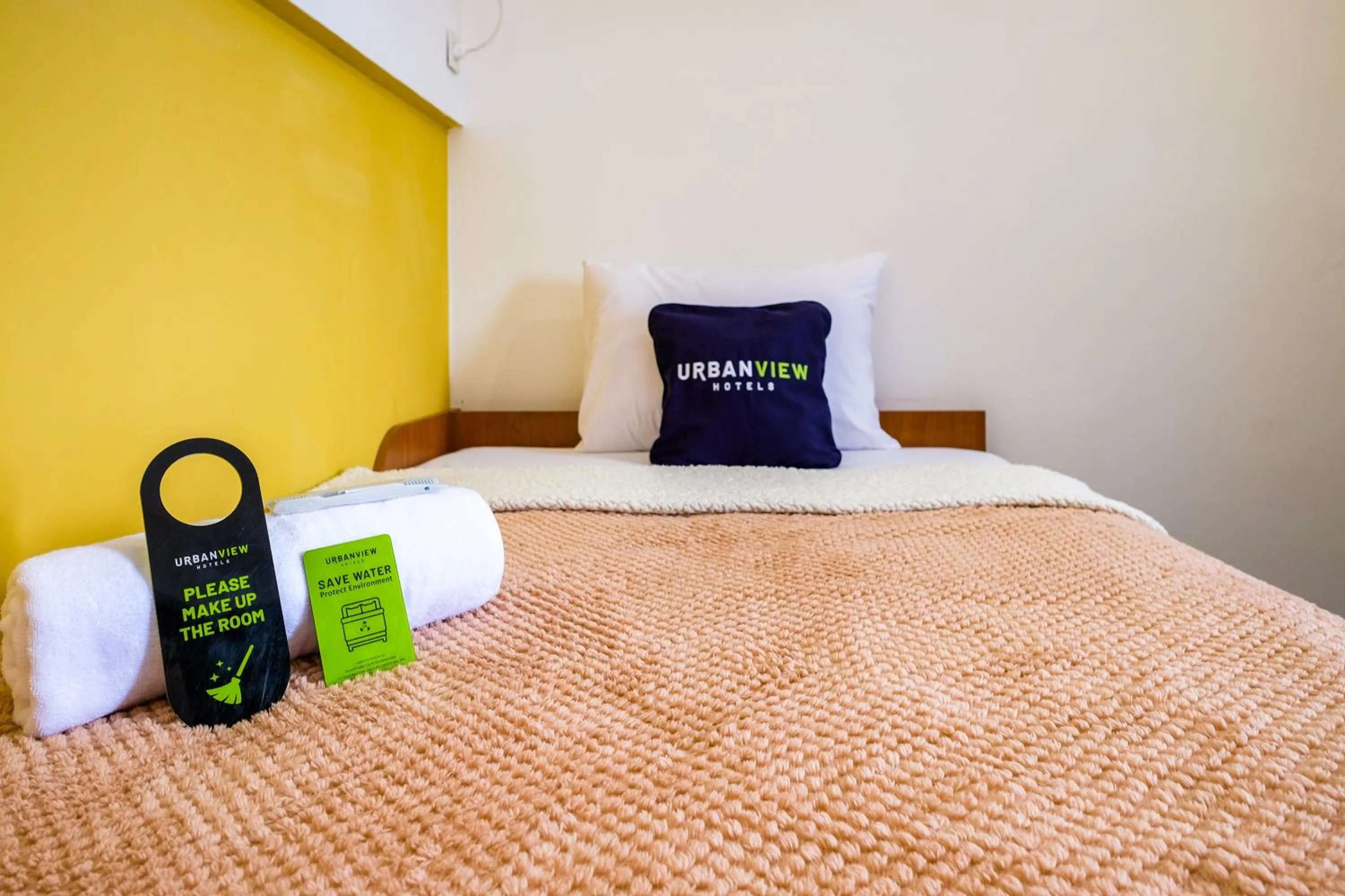 Bed in Urbanview Syariah Soul Sanctuary near Stasiun Purwokerto
