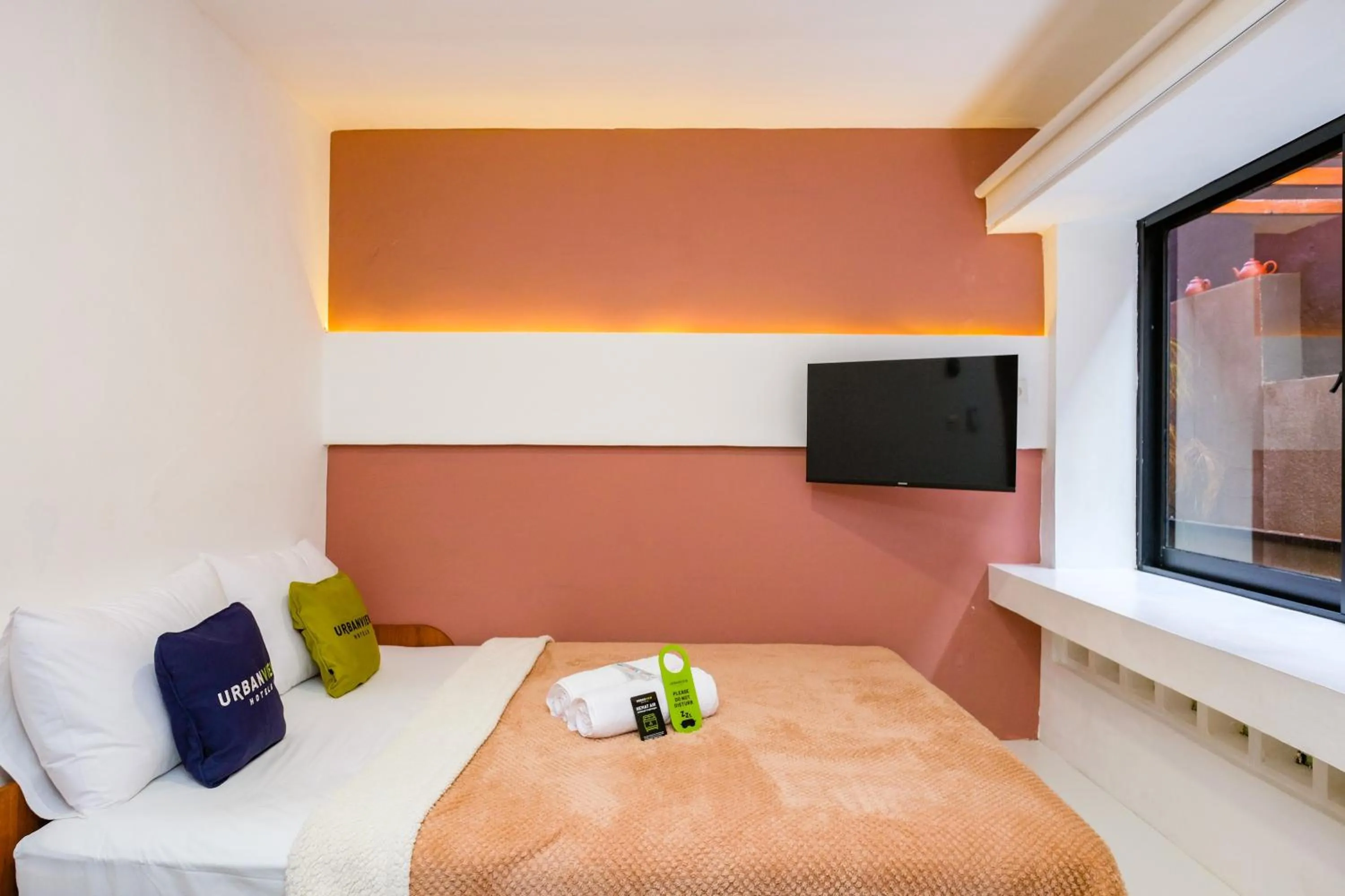 Bed in Urbanview Syariah Soul Sanctuary near Stasiun Purwokerto