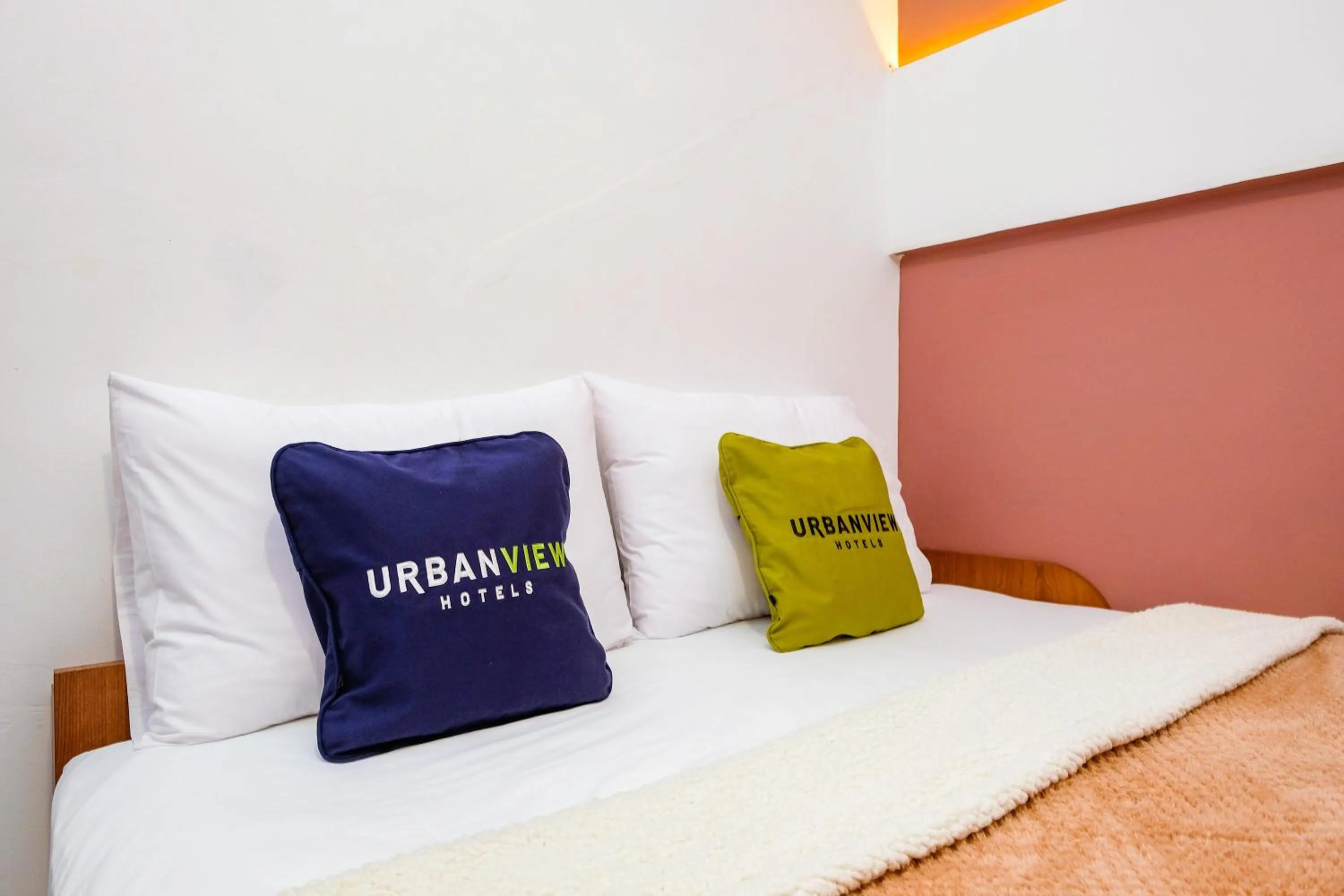 Bed in Urbanview Syariah Soul Sanctuary near Stasiun Purwokerto