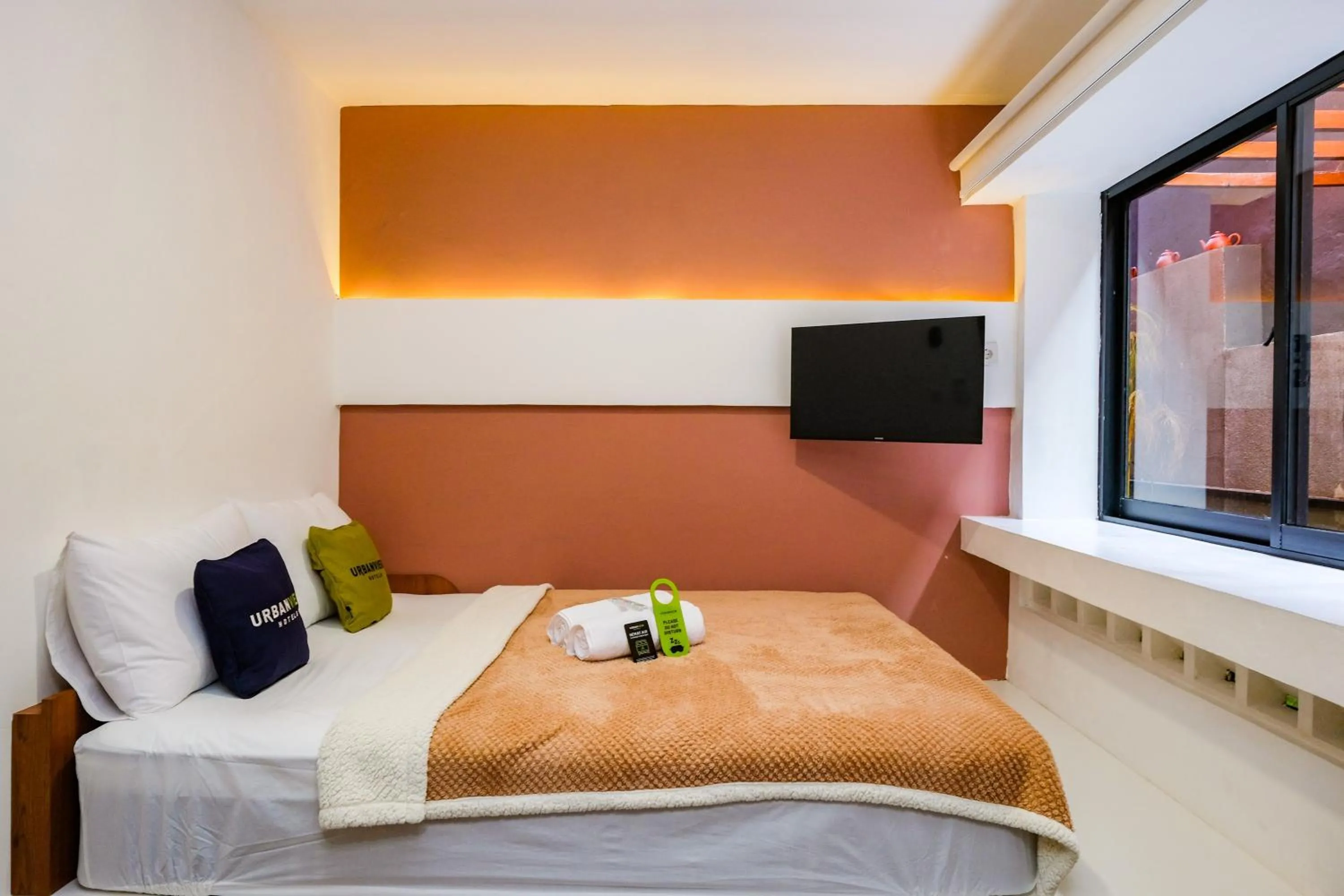 Bed in Urbanview Syariah Soul Sanctuary near Stasiun Purwokerto