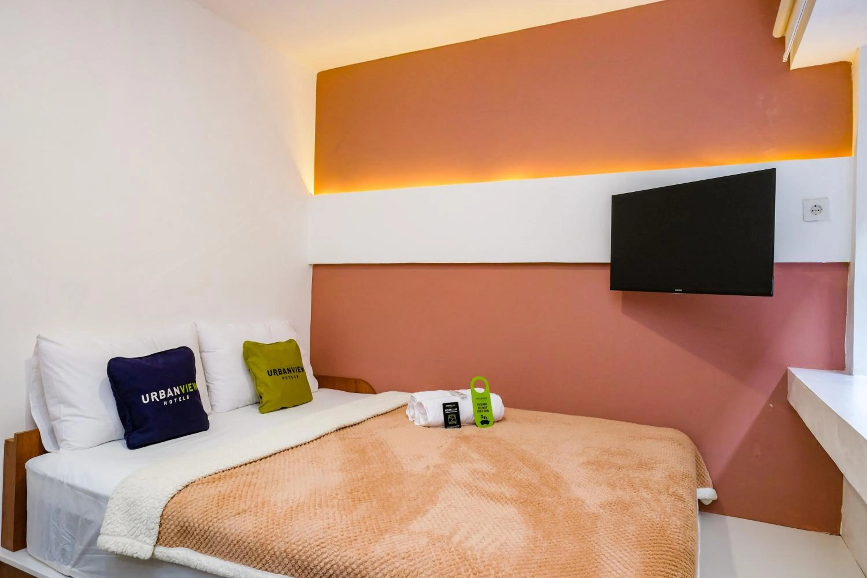 Bed in Urbanview Syariah Soul Sanctuary near Stasiun Purwokerto