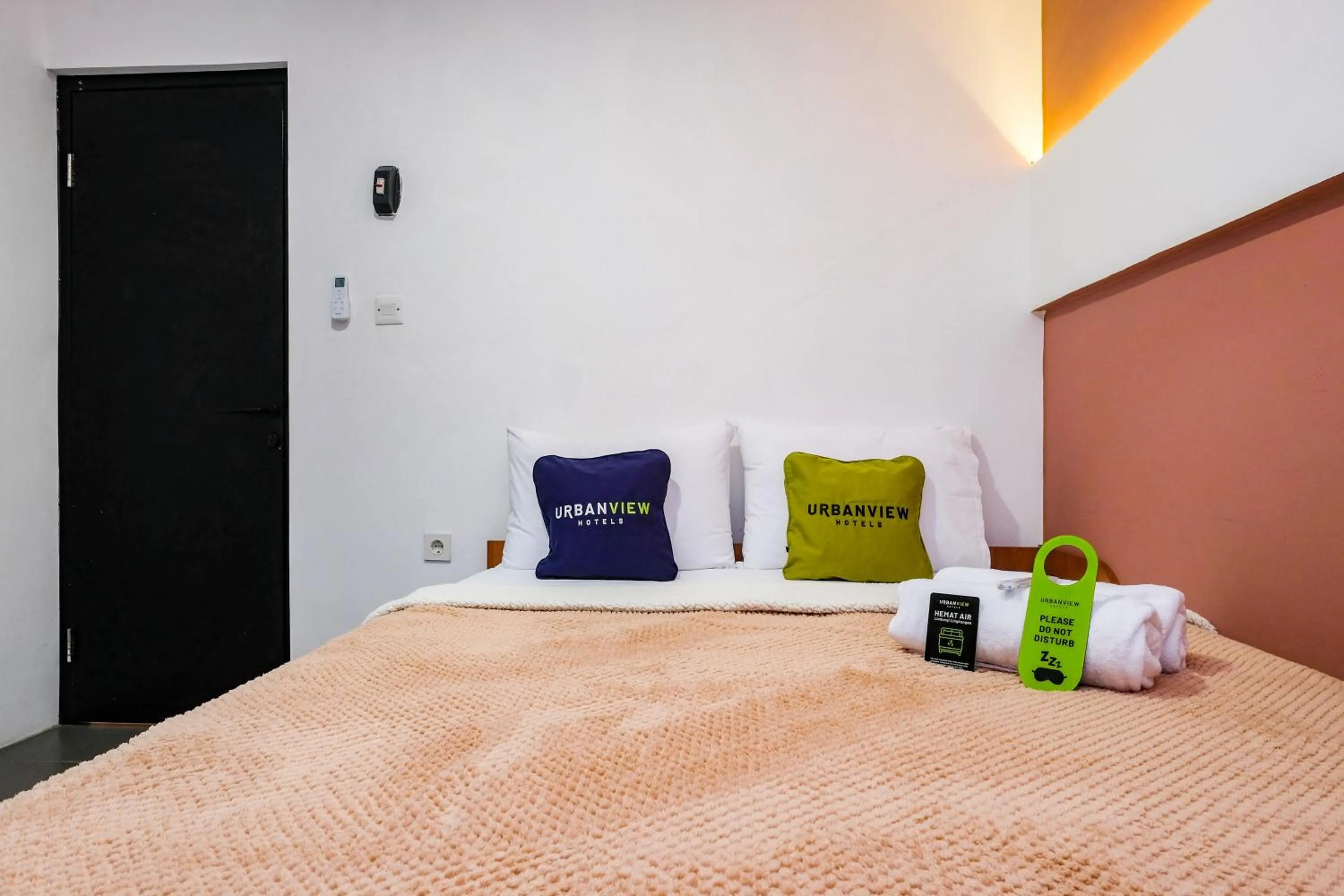 Bed in Urbanview Syariah Soul Sanctuary near Stasiun Purwokerto