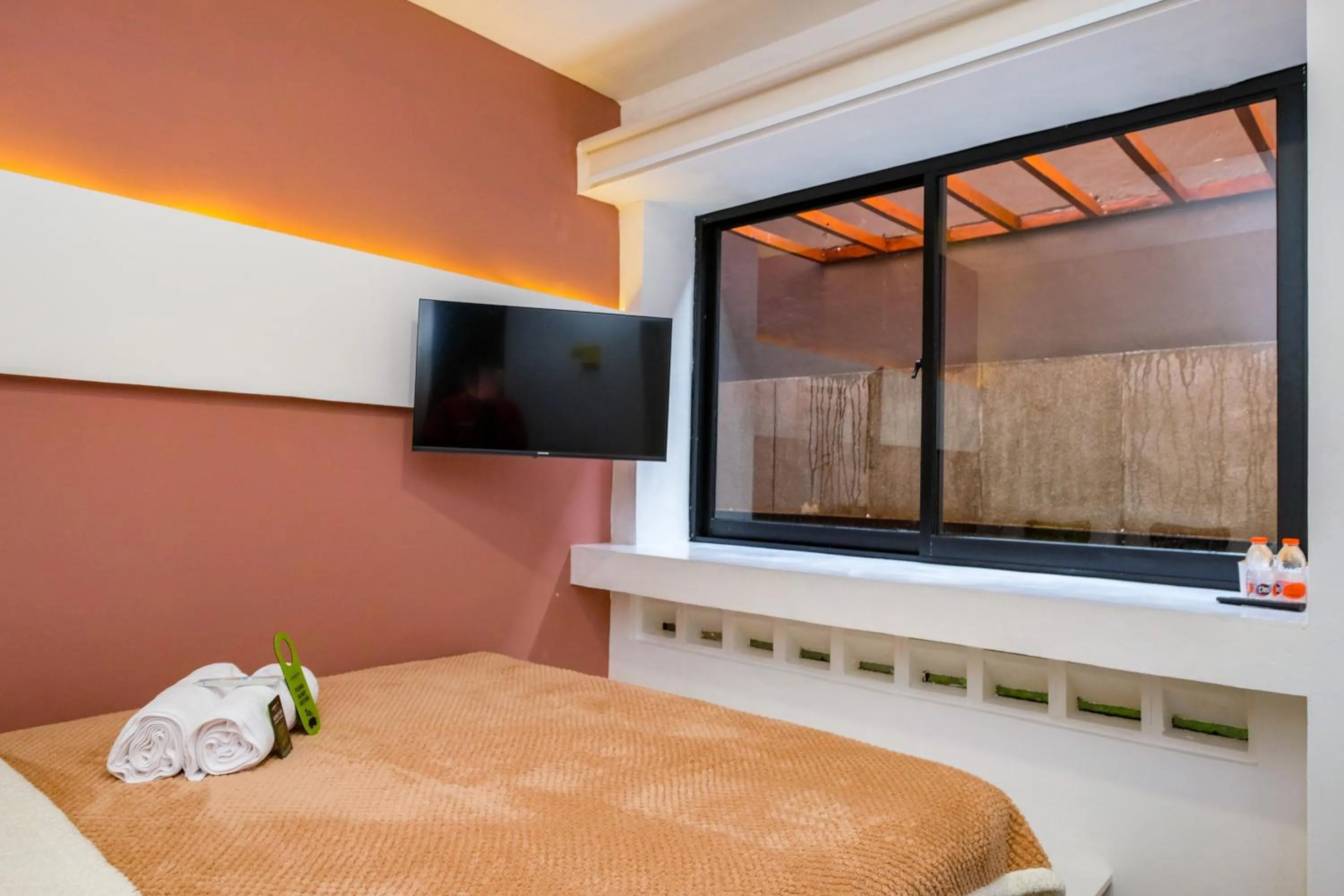 Bed in Urbanview Syariah Soul Sanctuary near Stasiun Purwokerto