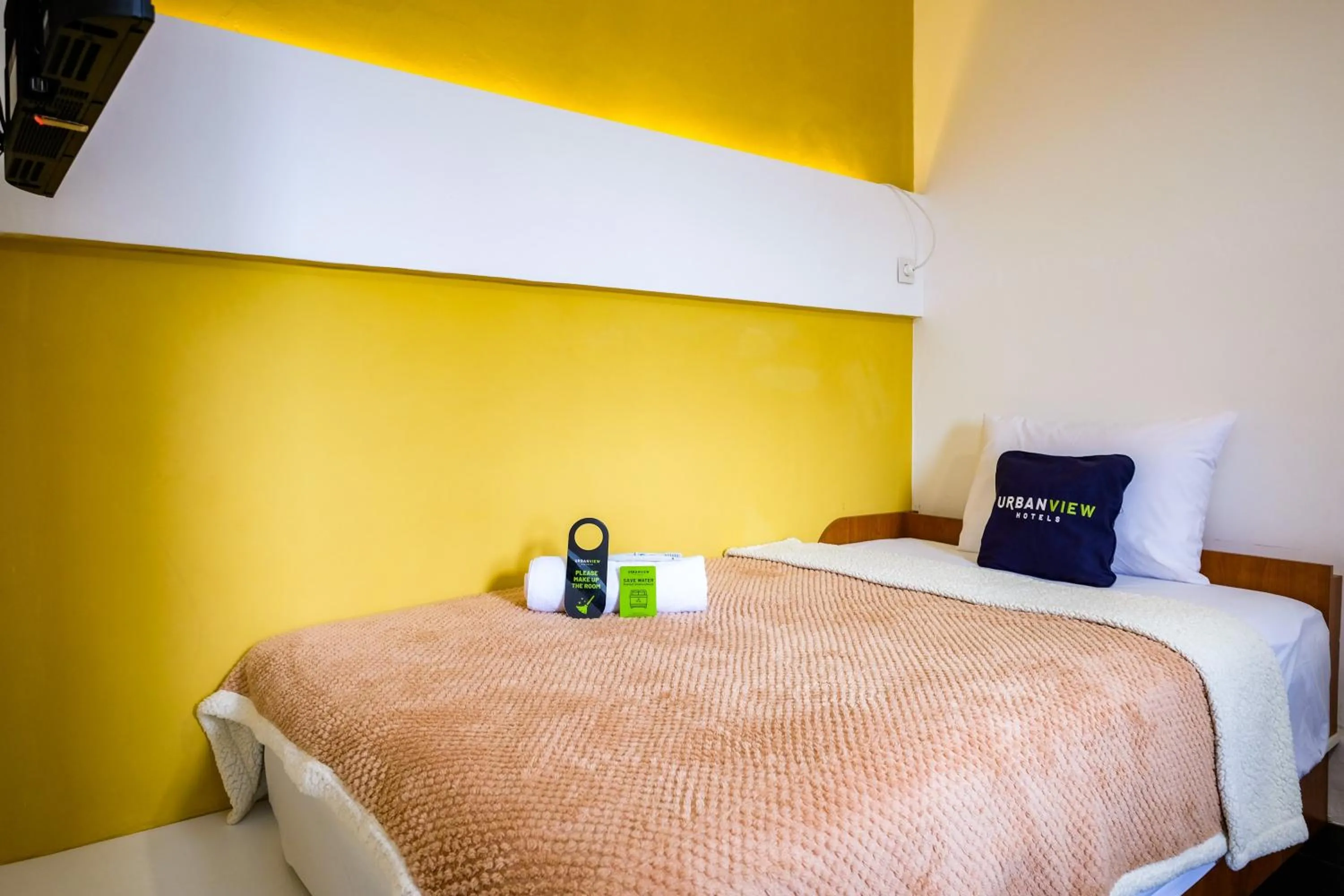 Bed in Urbanview Syariah Soul Sanctuary near Stasiun Purwokerto