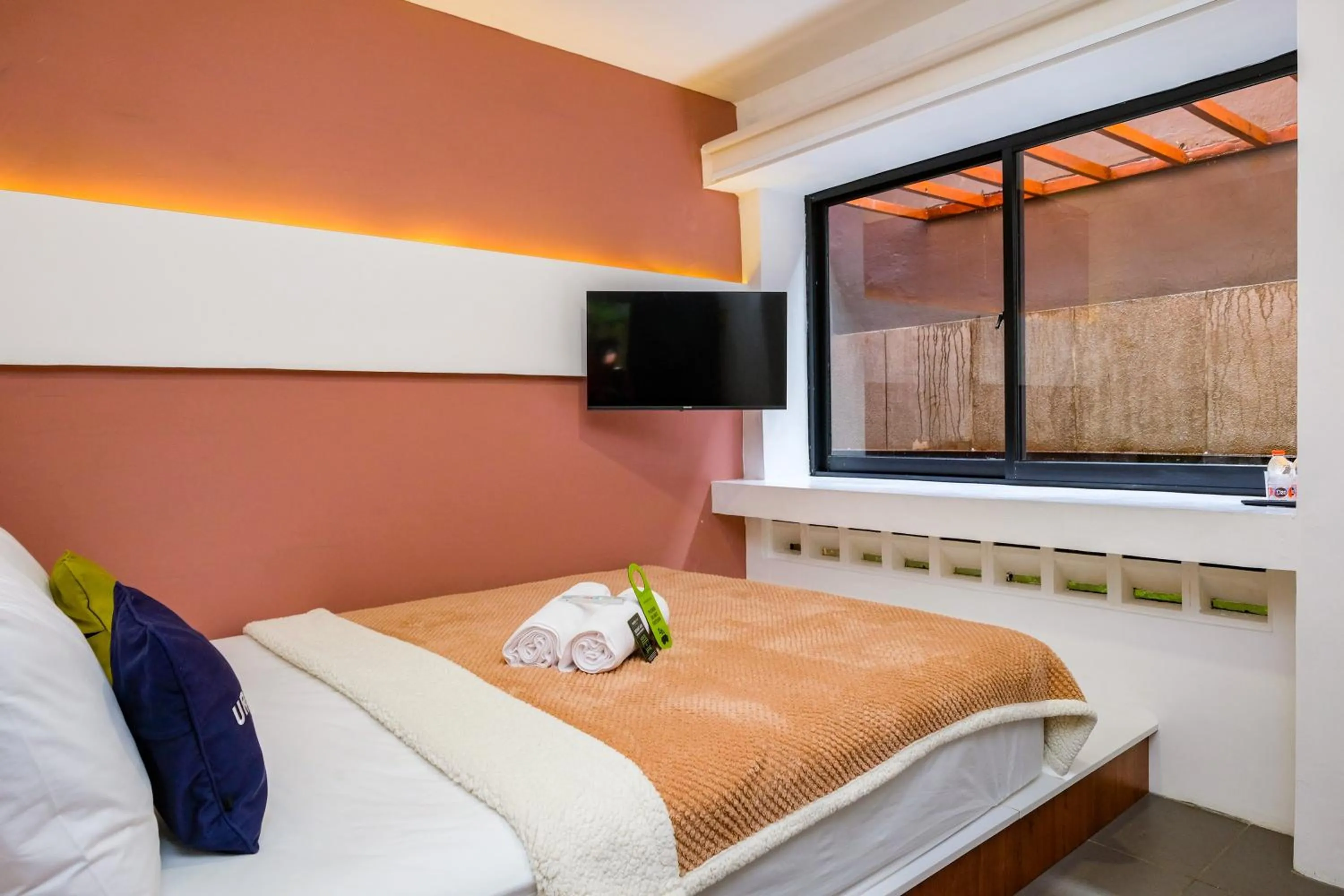 Bed in Urbanview Syariah Soul Sanctuary near Stasiun Purwokerto