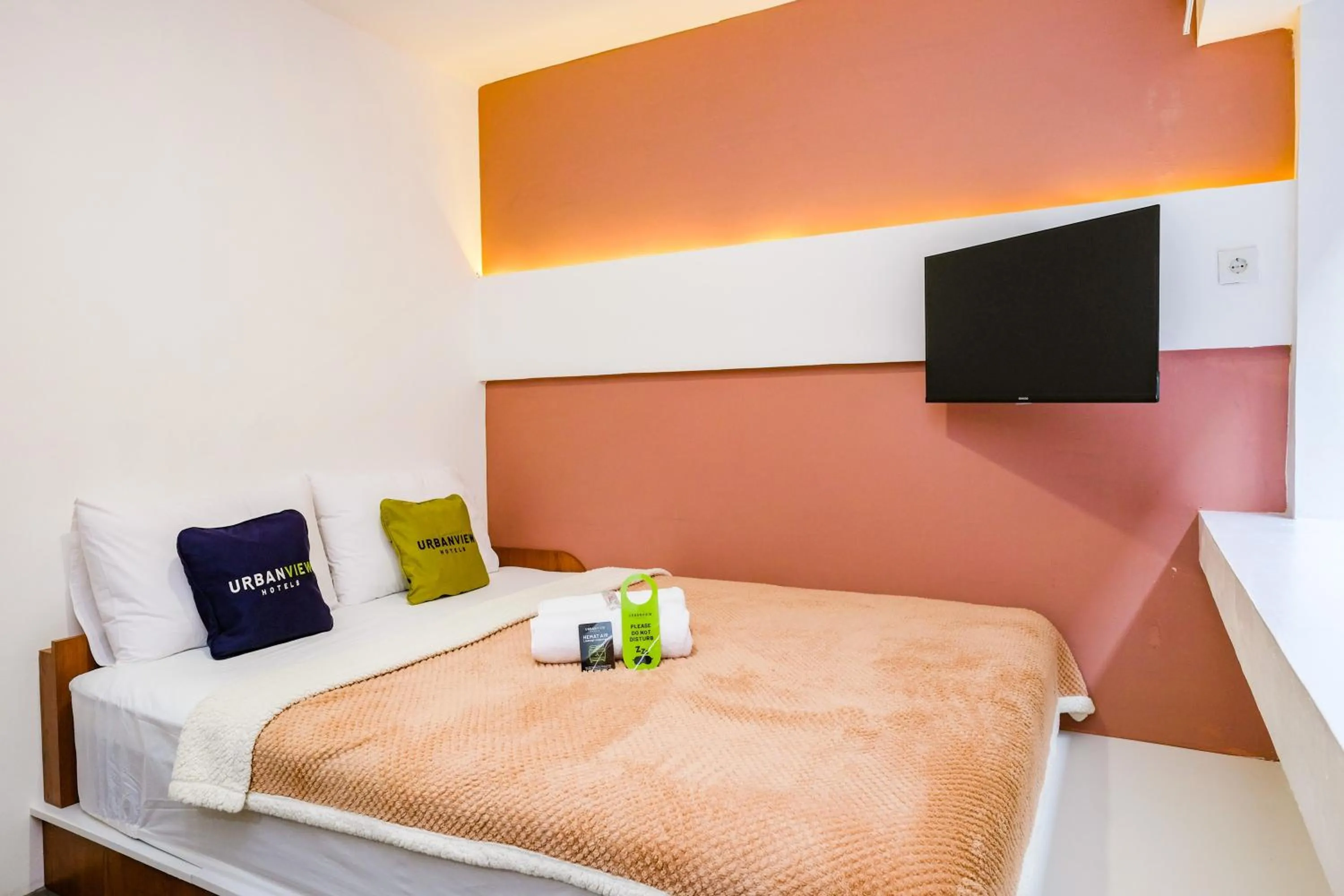 Bed in Urbanview Syariah Soul Sanctuary near Stasiun Purwokerto