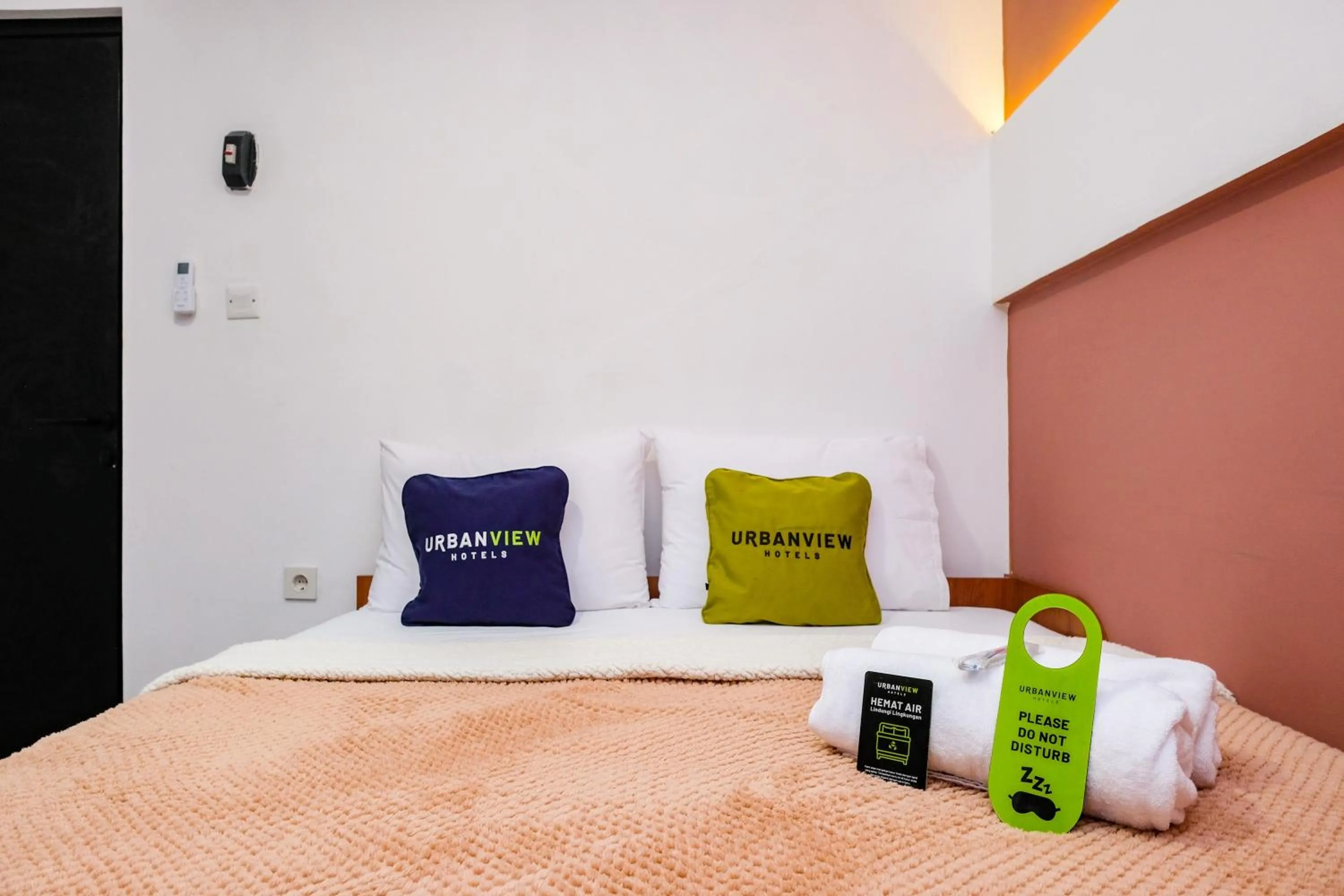 Bed in Urbanview Syariah Soul Sanctuary near Stasiun Purwokerto
