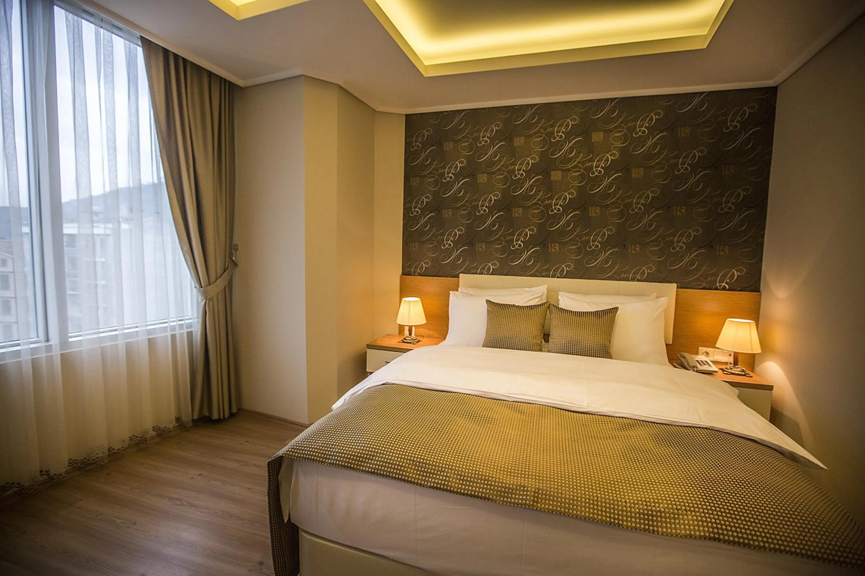 Bedroom in Park Square Hotel