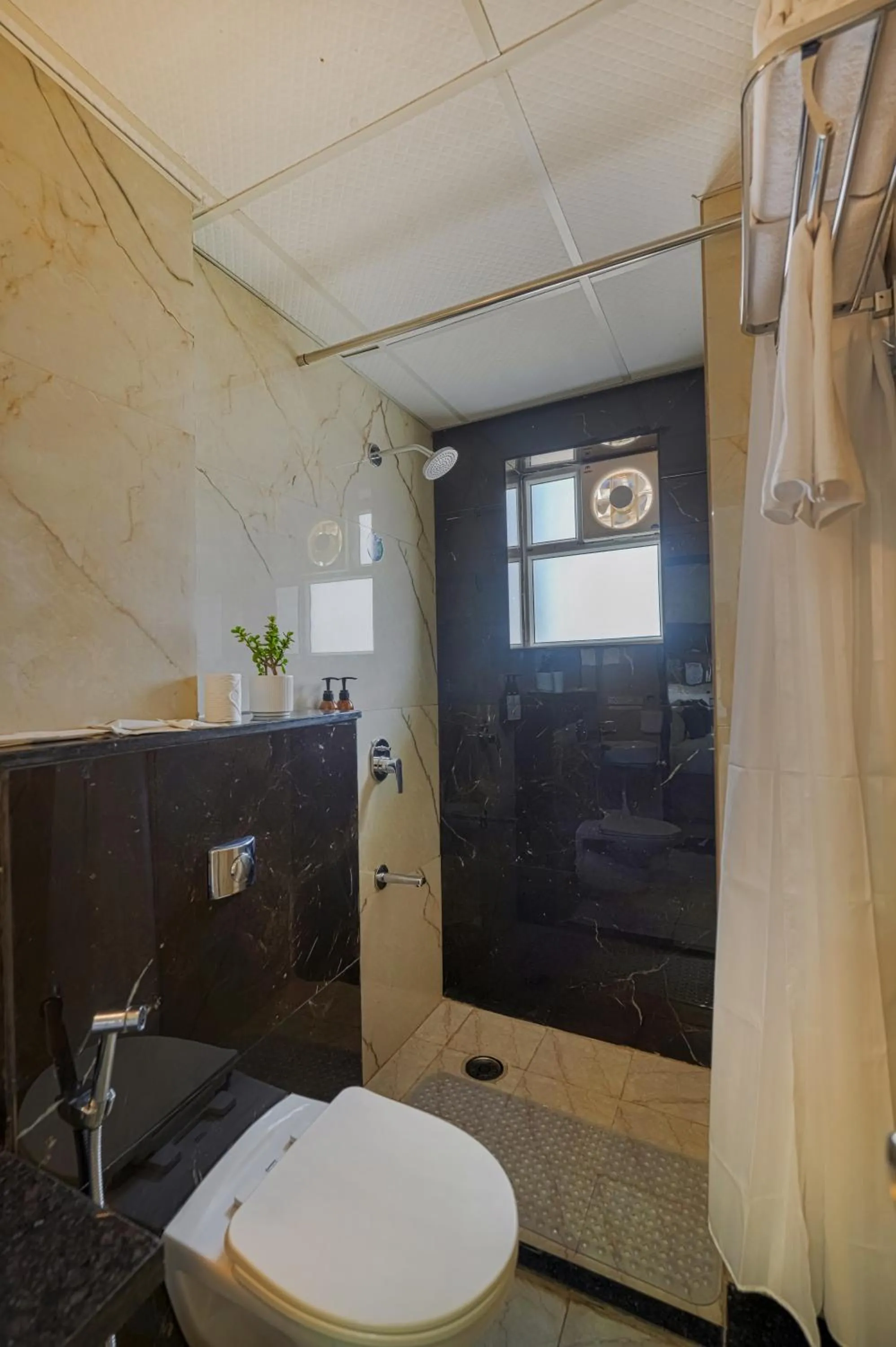 Bathroom in Urban Suites by BluSalzz, Jaipur - Rajasthan