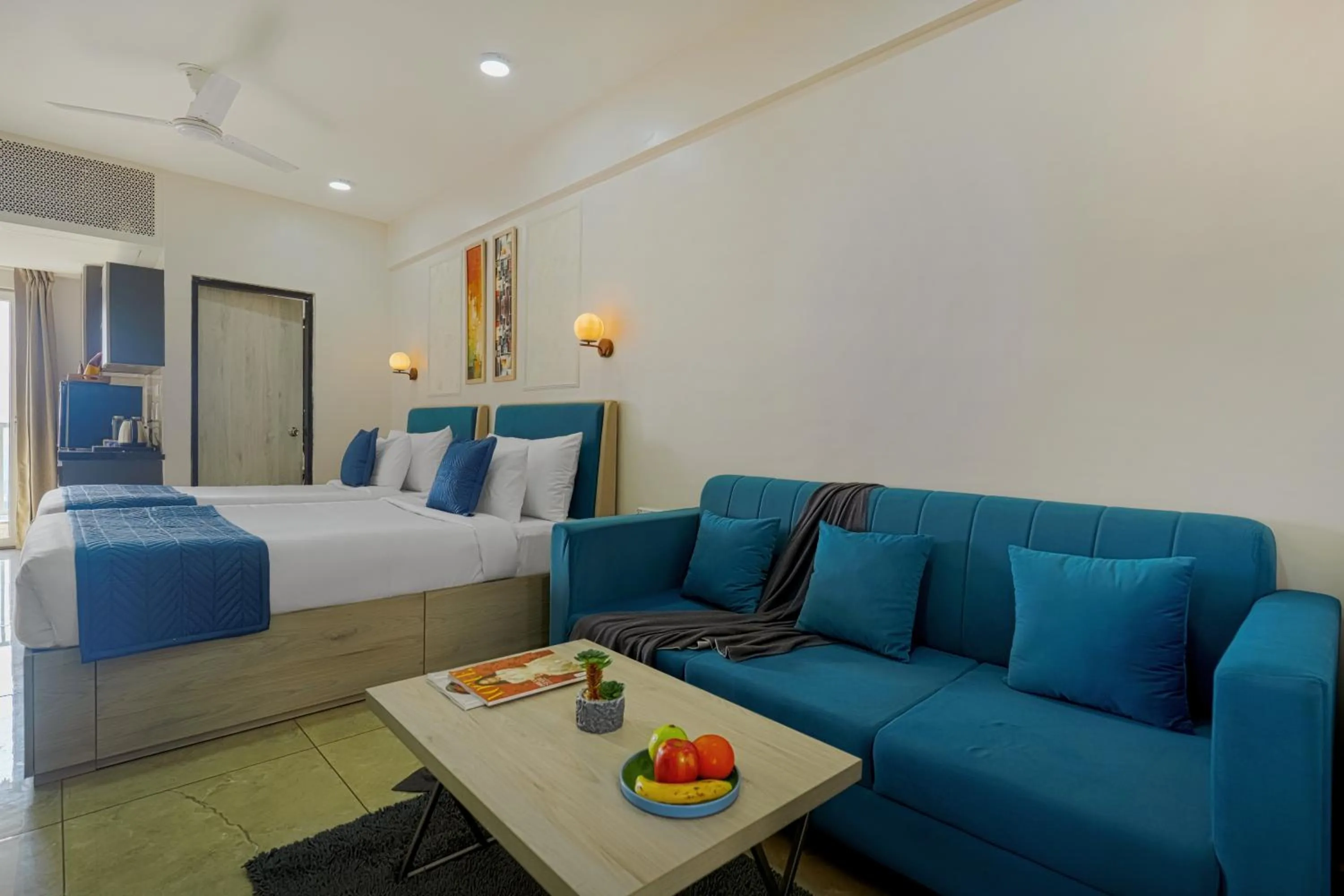 Seating area, Bed in Urban Suites by BluSalzz, Jaipur - Rajasthan