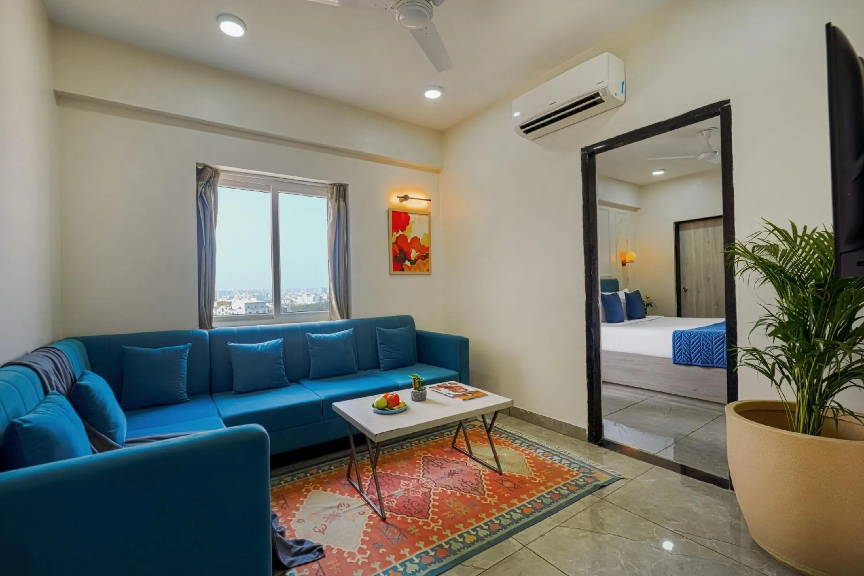Seating area, Bed in Urban Suites by BluSalzz, Jaipur - Rajasthan