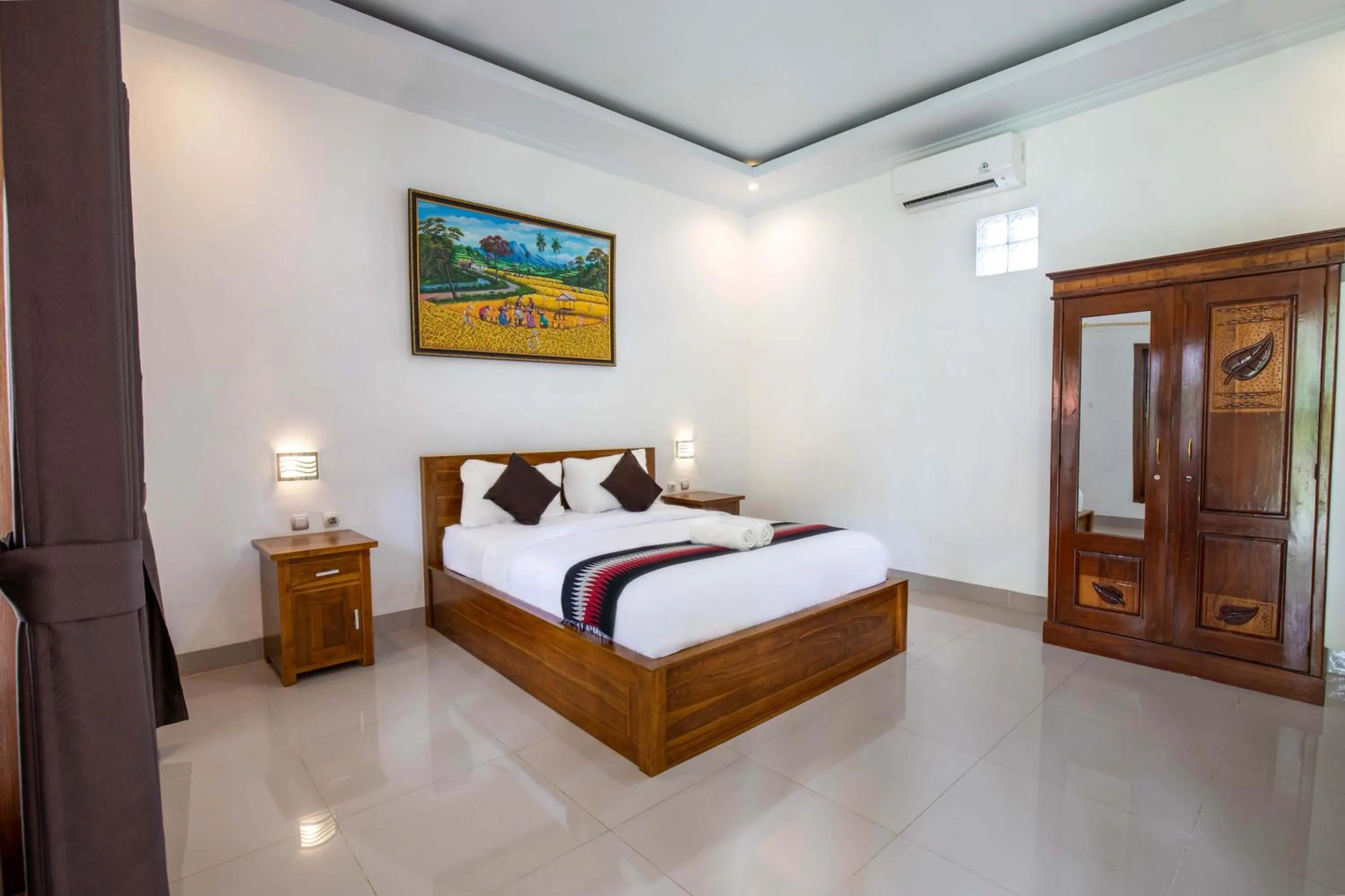 Bed in Coconut Hill Cottage
