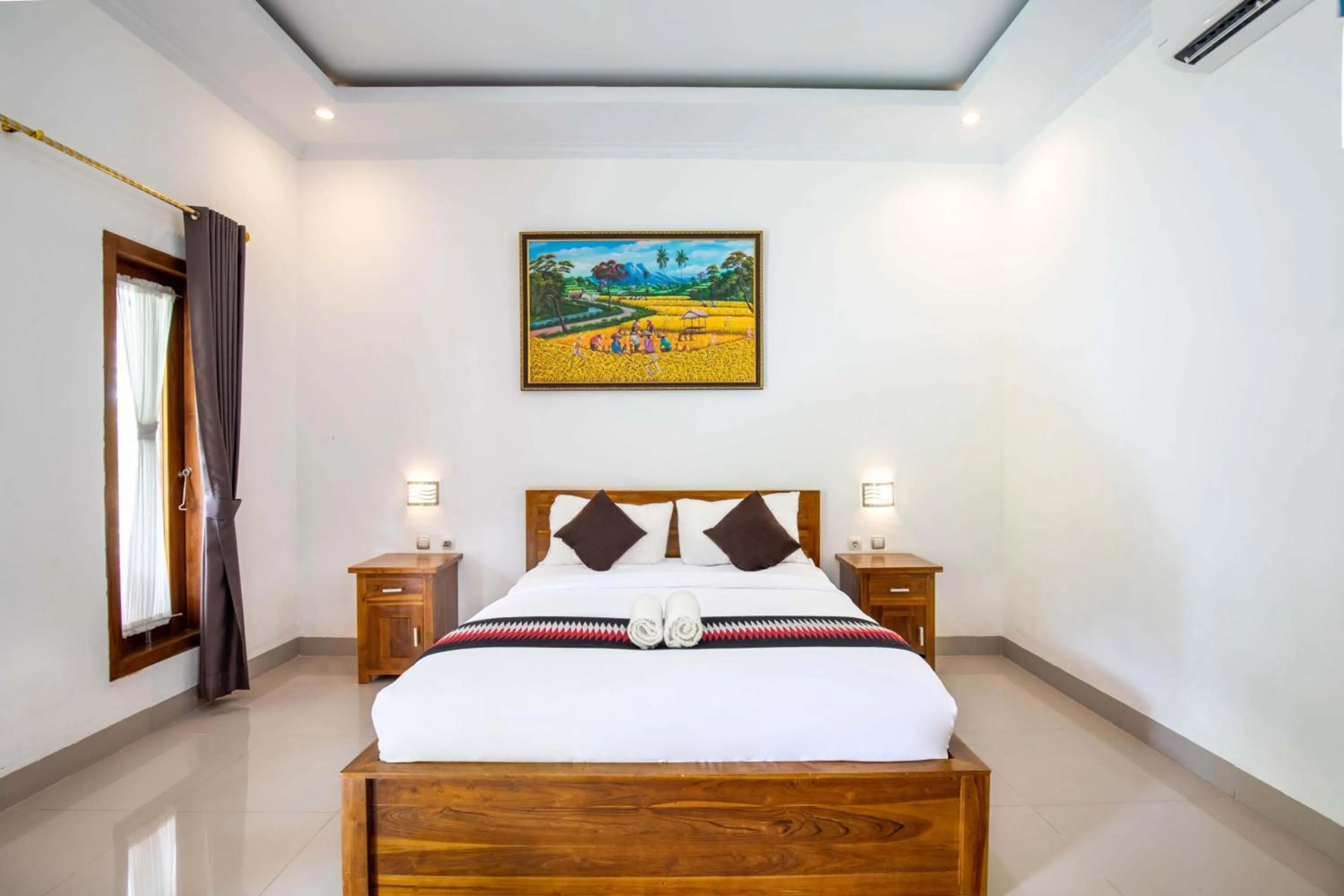 Bed in Coconut Hill Cottage