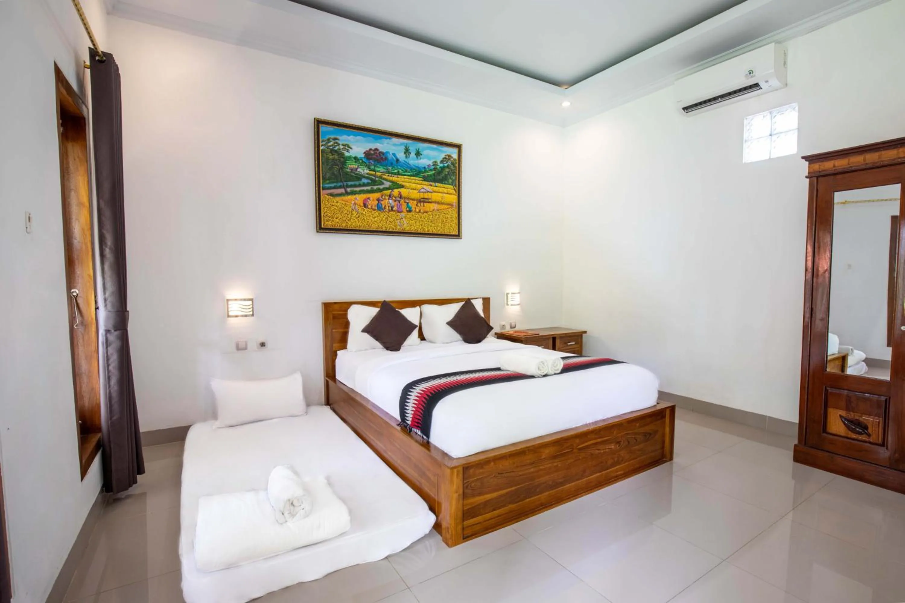 Bed in Coconut Hill Cottage