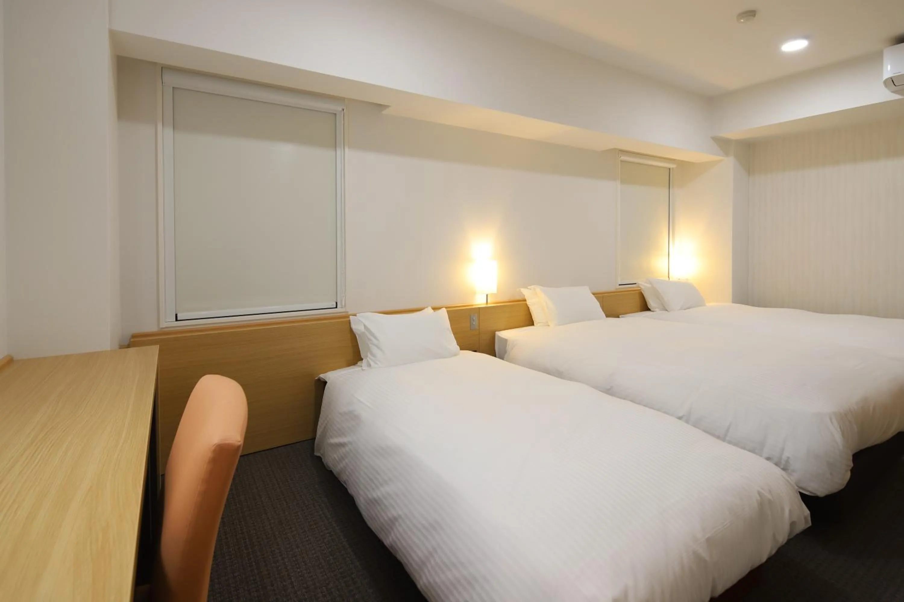 Bed in AB Hotel Kani