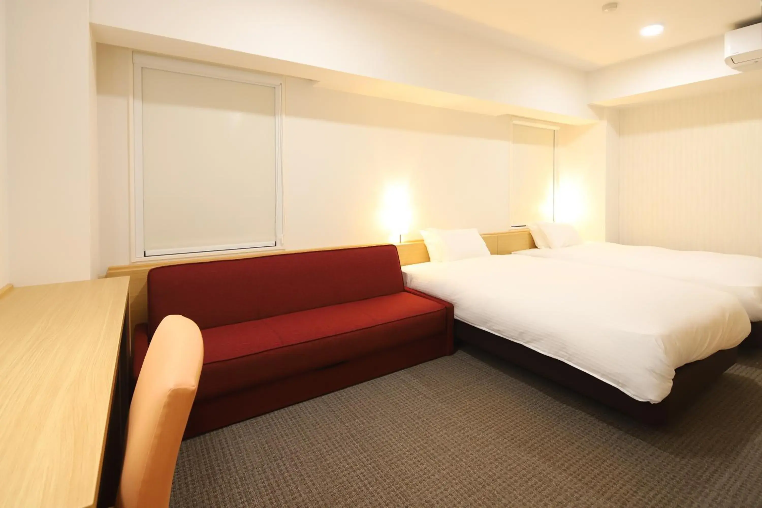 Bed in AB Hotel Kani Bed in AB Hotel Kani