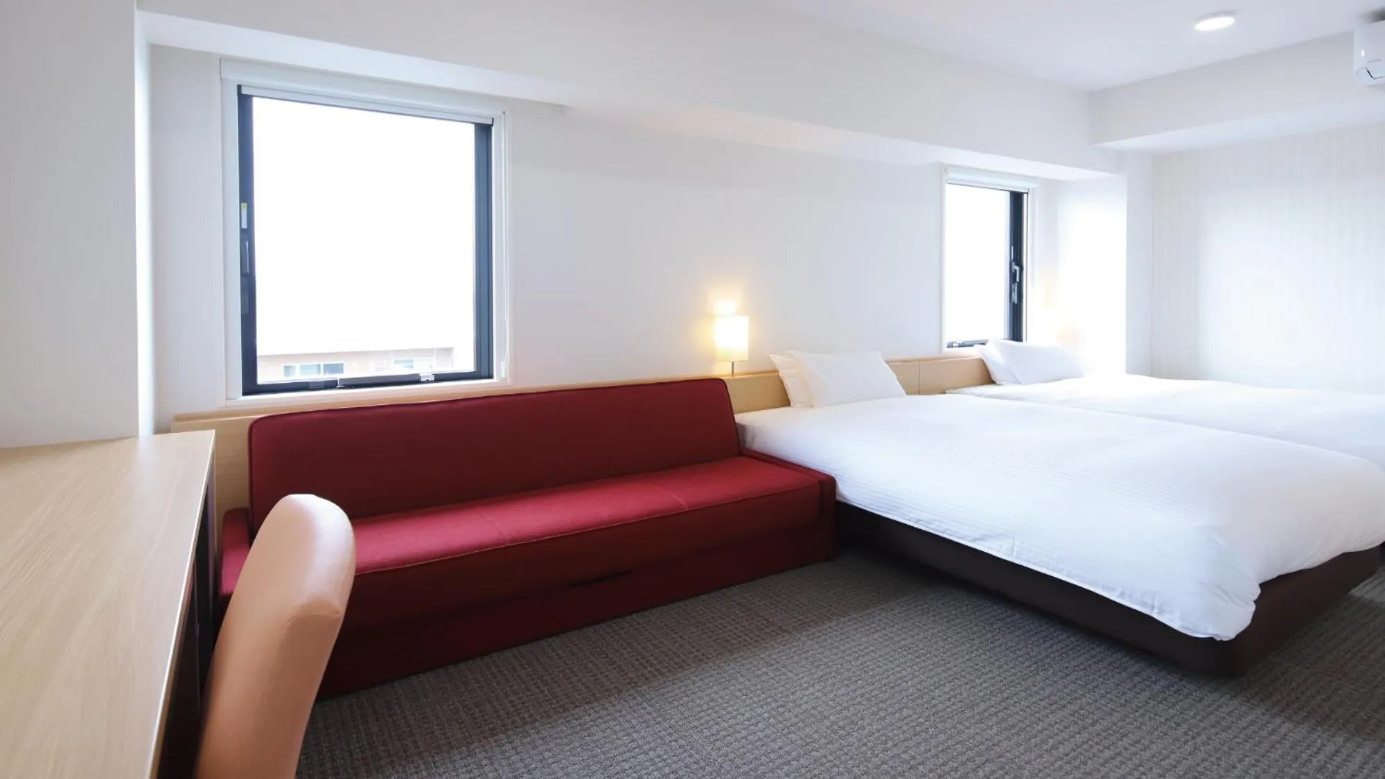 Bed in AB Hotel Kani