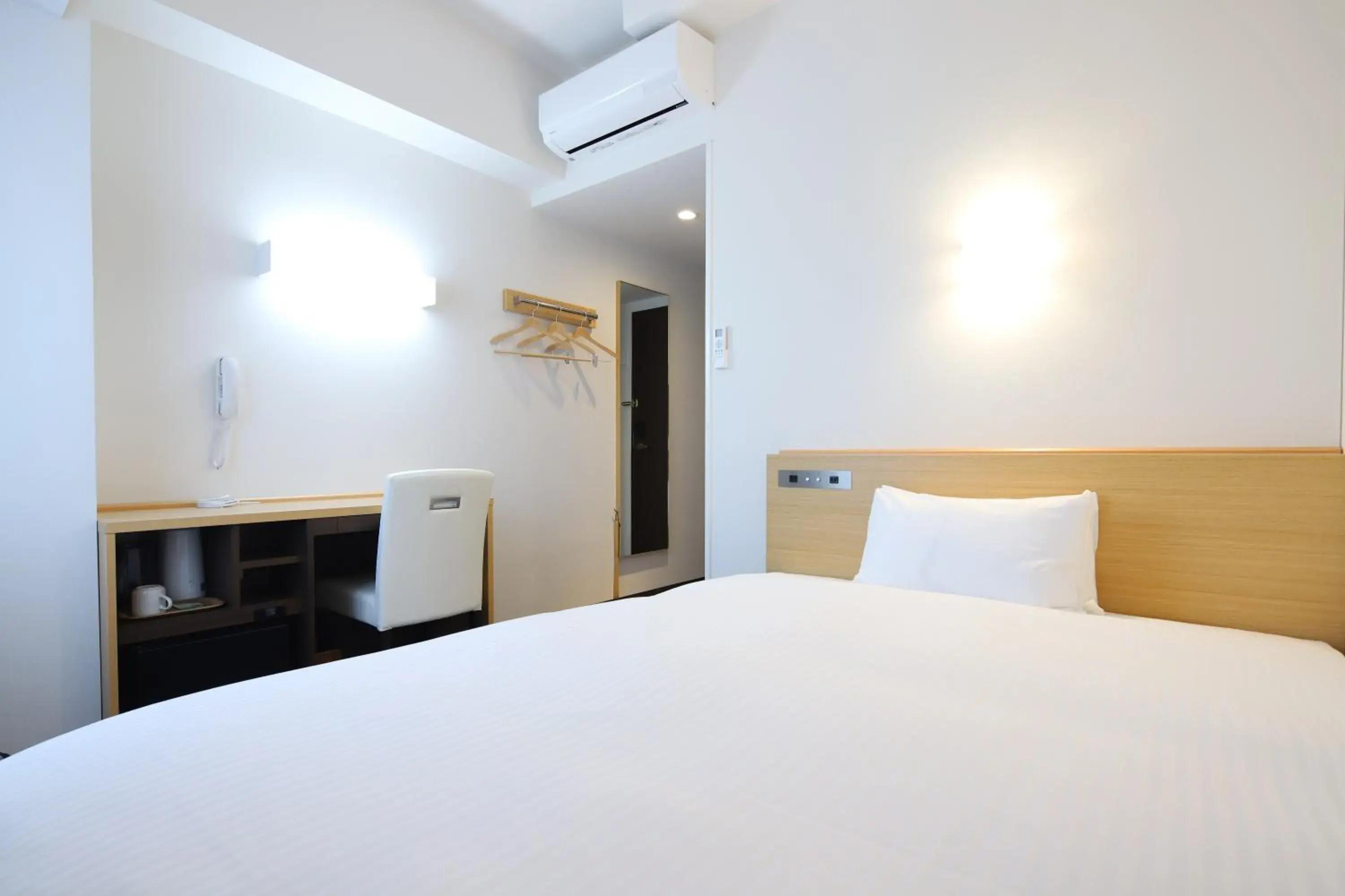 Bed in AB Hotel Kani Bed in AB Hotel Kani