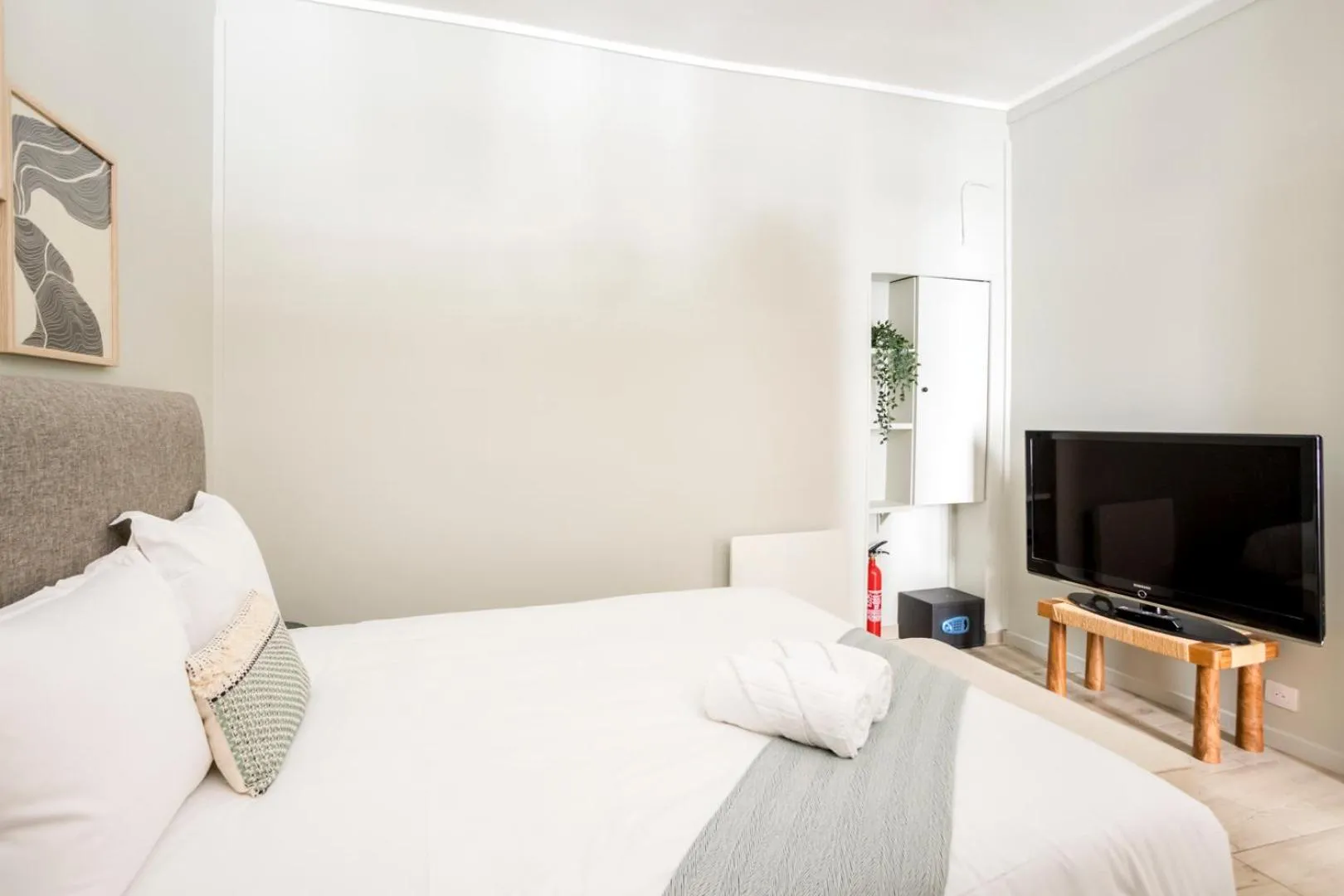 Bed in Reva Suites