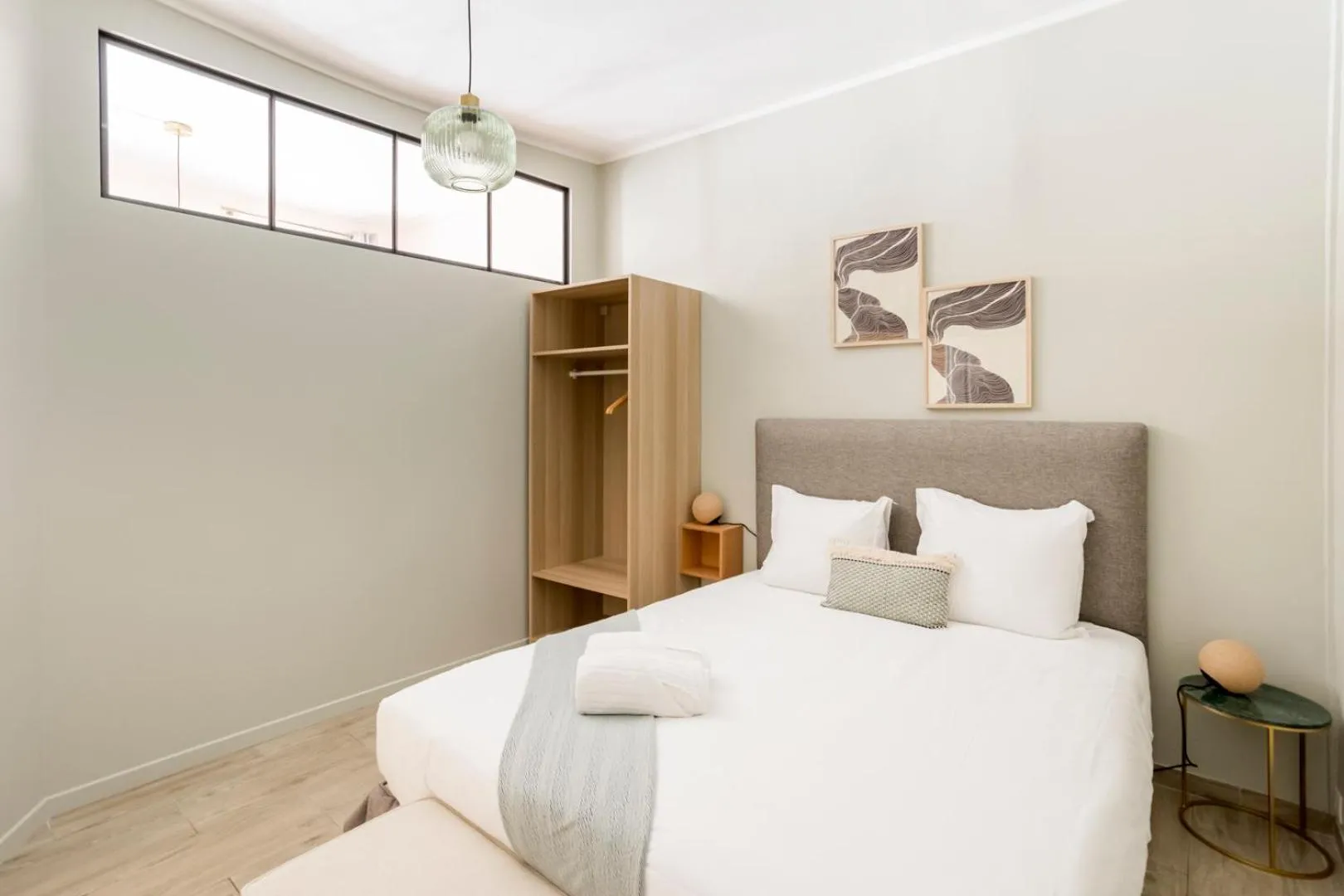 Bed in Reva Suites