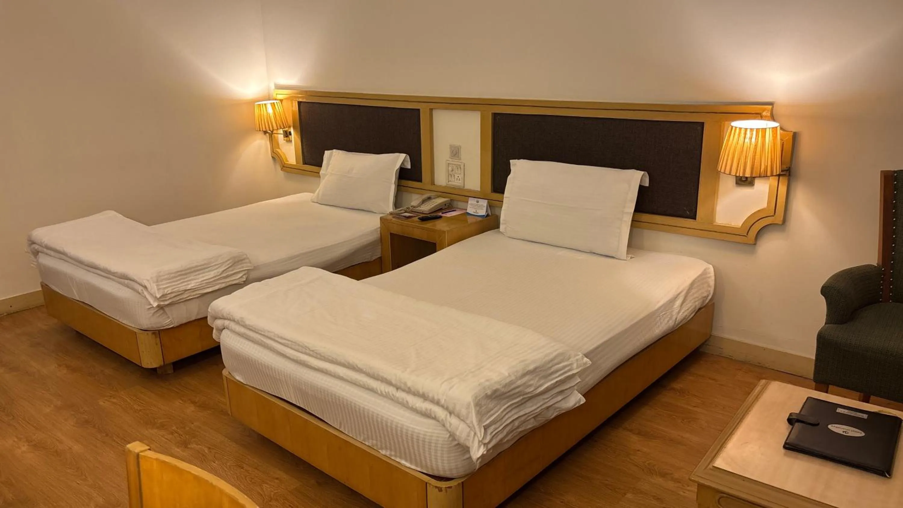 Bed in Chanakya Hotel, Patna