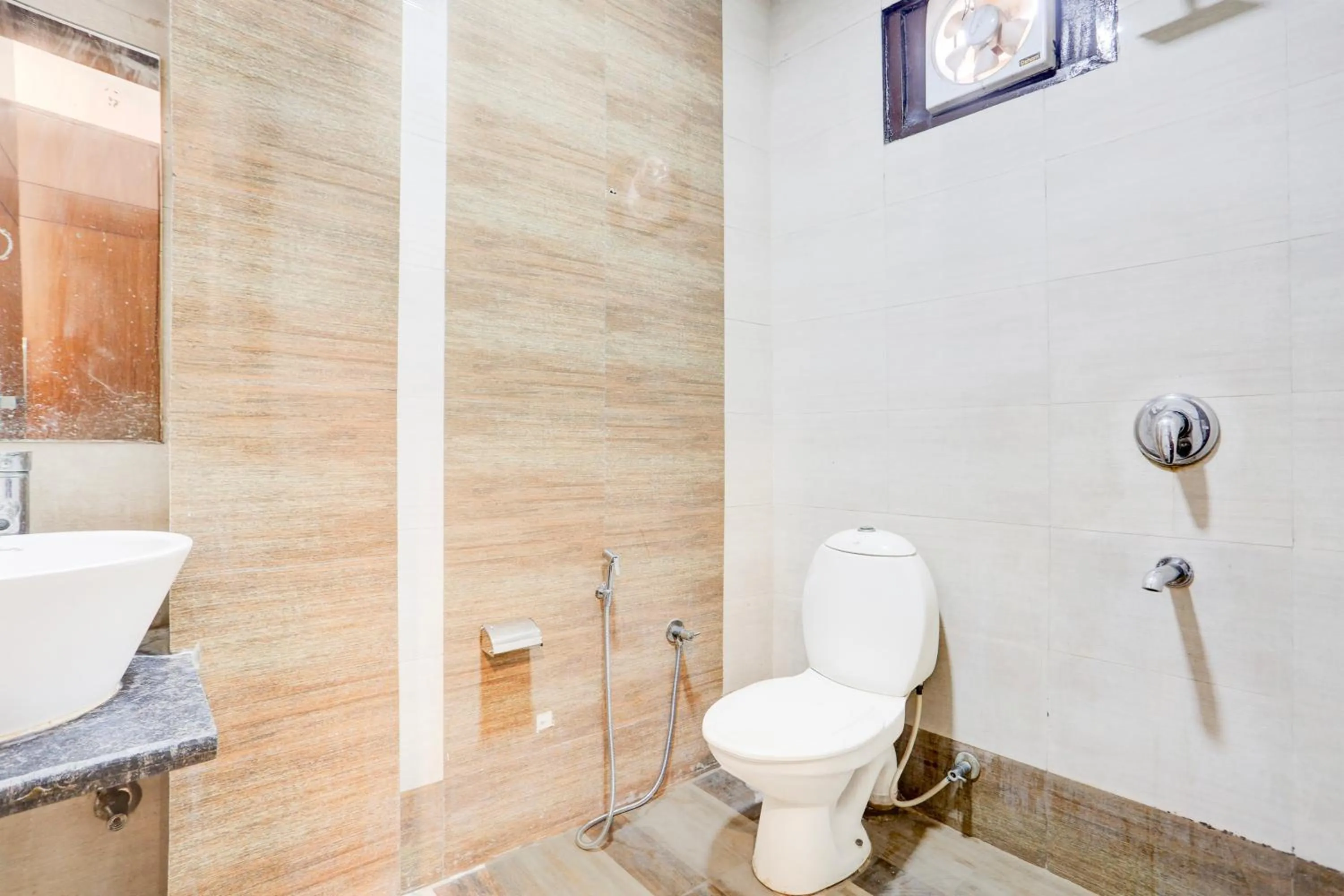 Bathroom in Collection O Mahipalpur Near Airport Formerly Jindal Palace