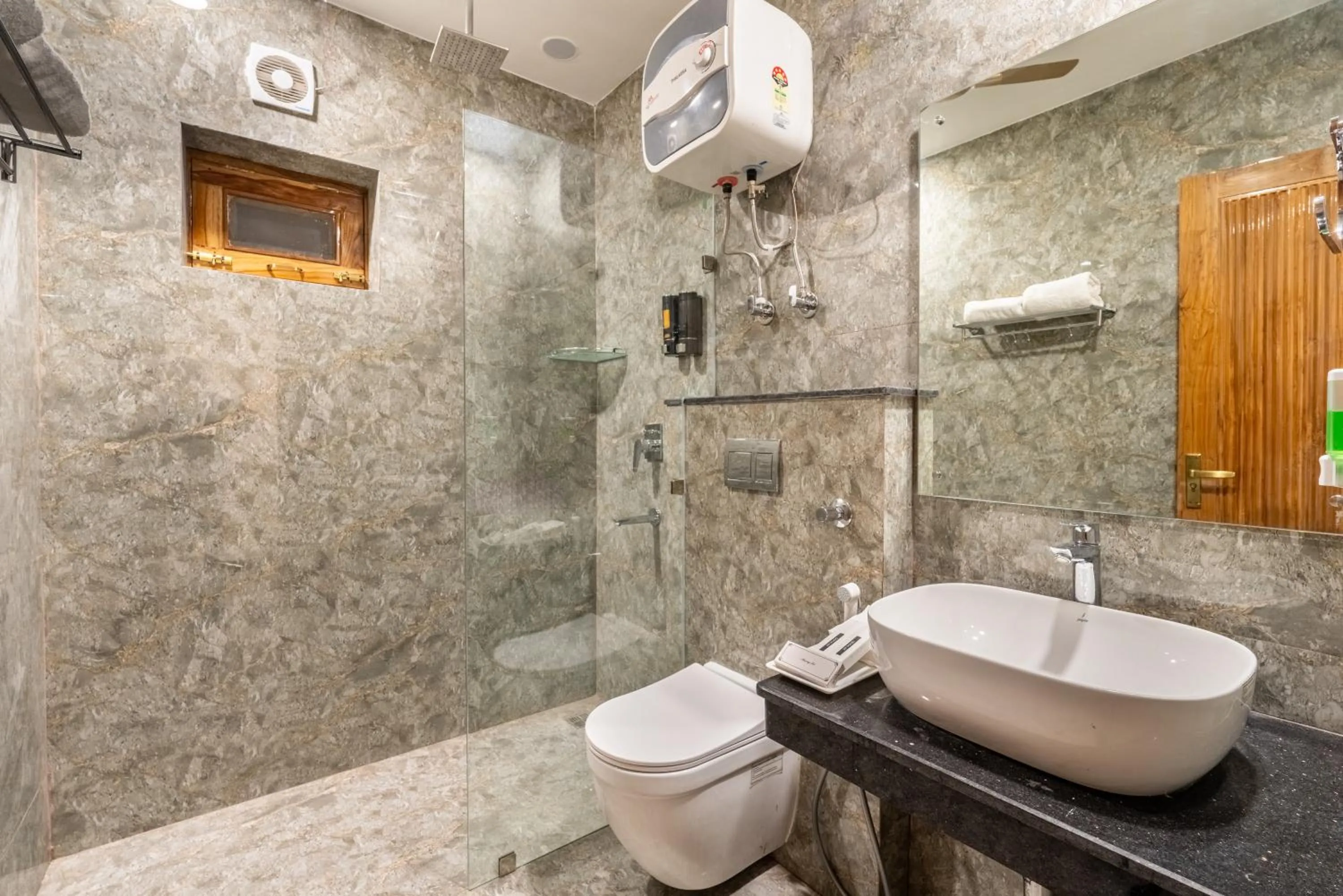 Shower in Lime Tree Hotel & One Bed Room Serviced Apartment - Noida Next to Sector 50 Metro with Party Venue