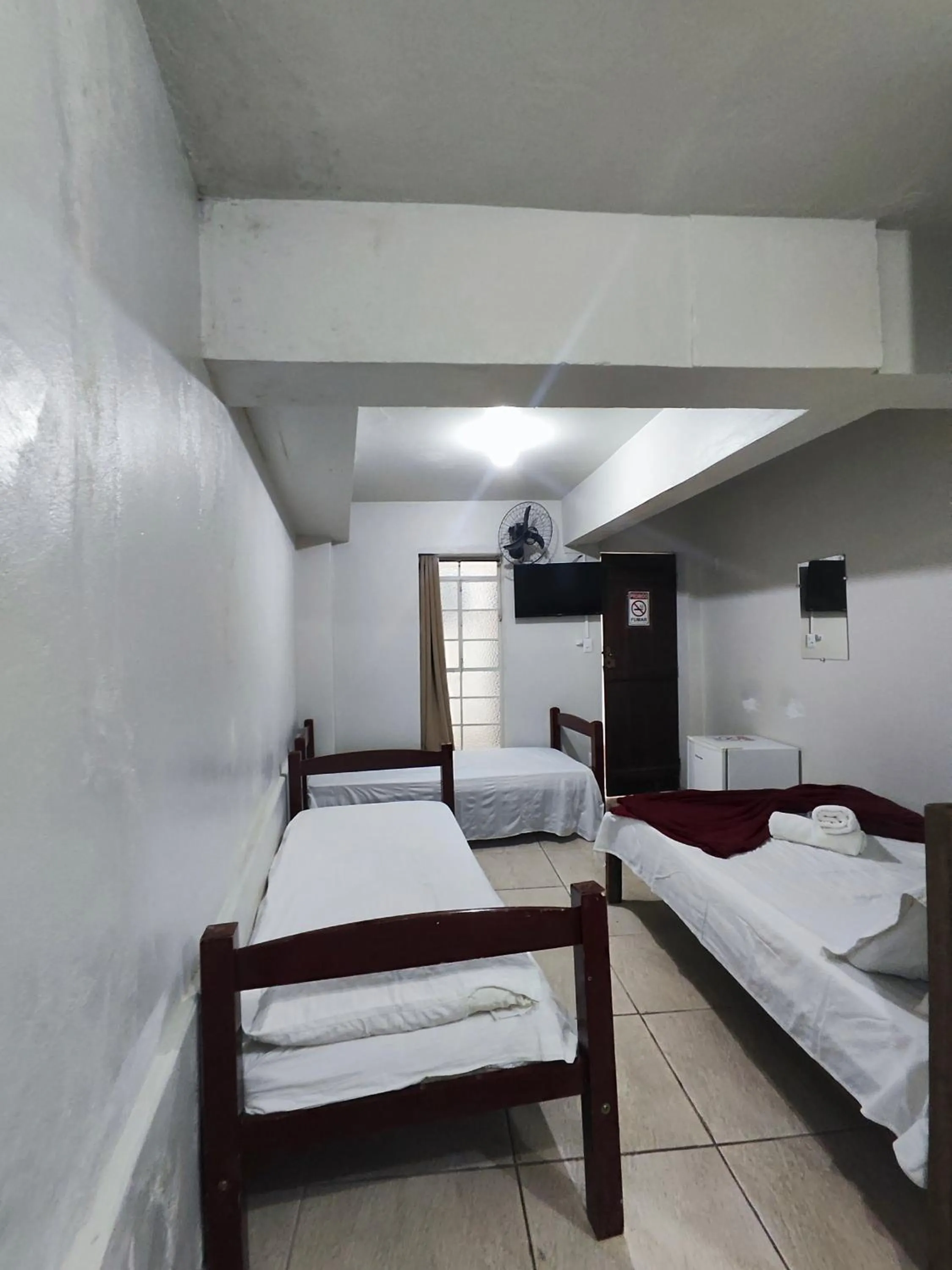 Bed in Pousada Acayaca