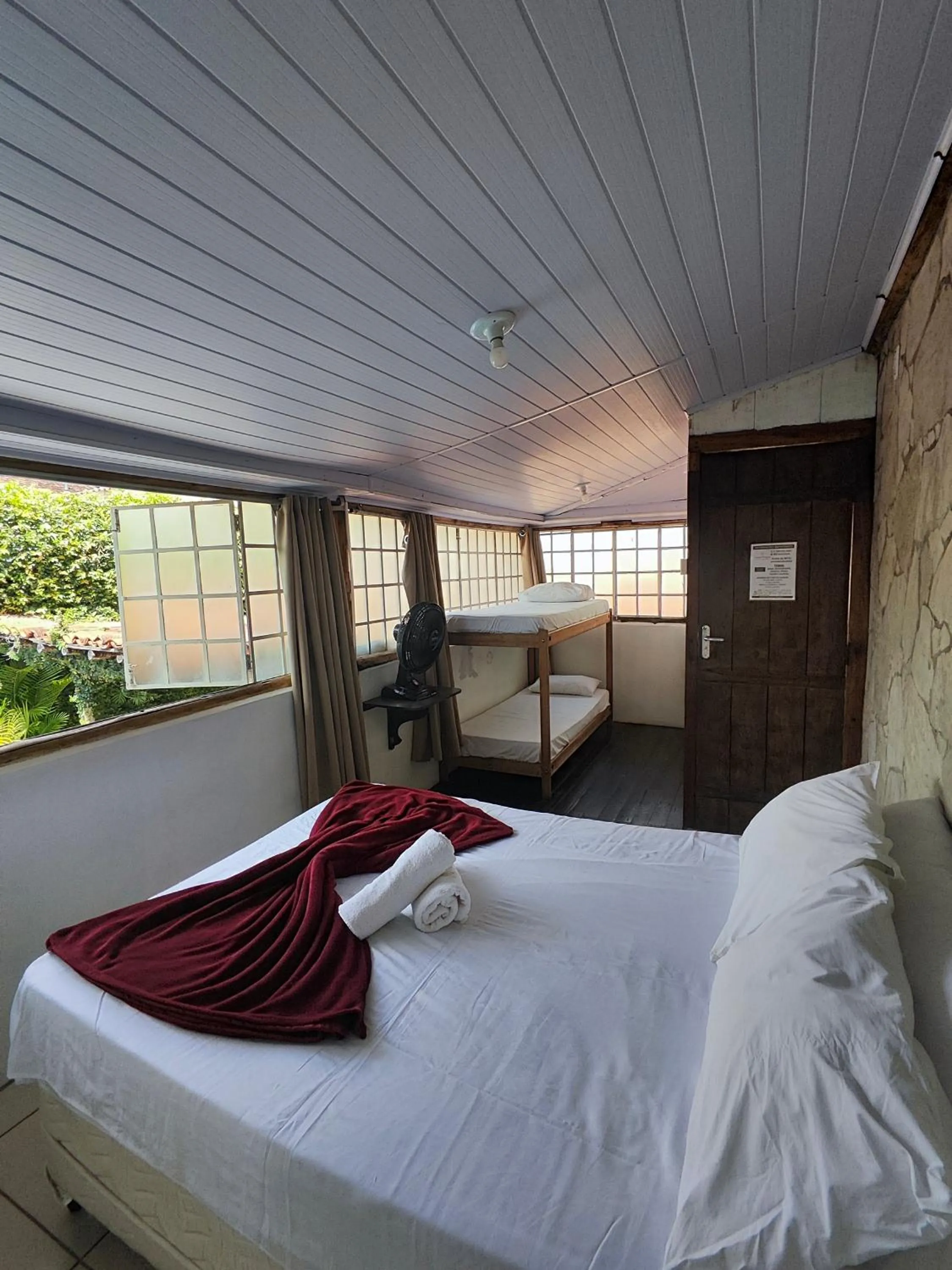 Bed in Pousada Acayaca