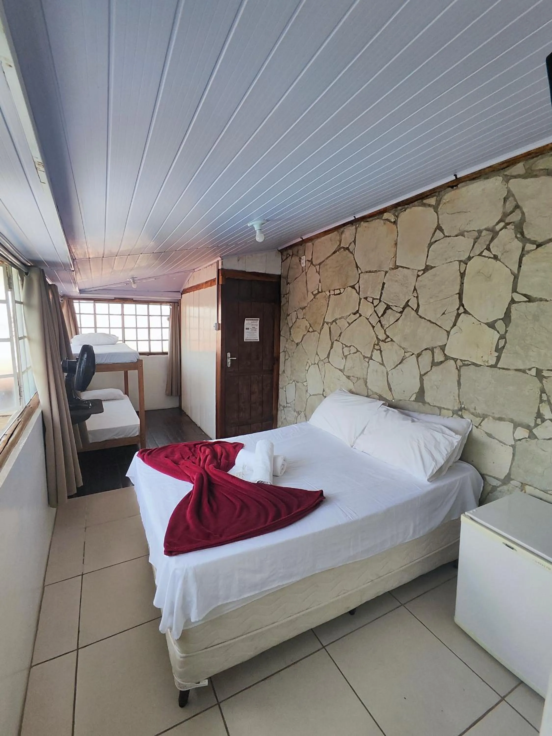 Bed in Pousada Acayaca