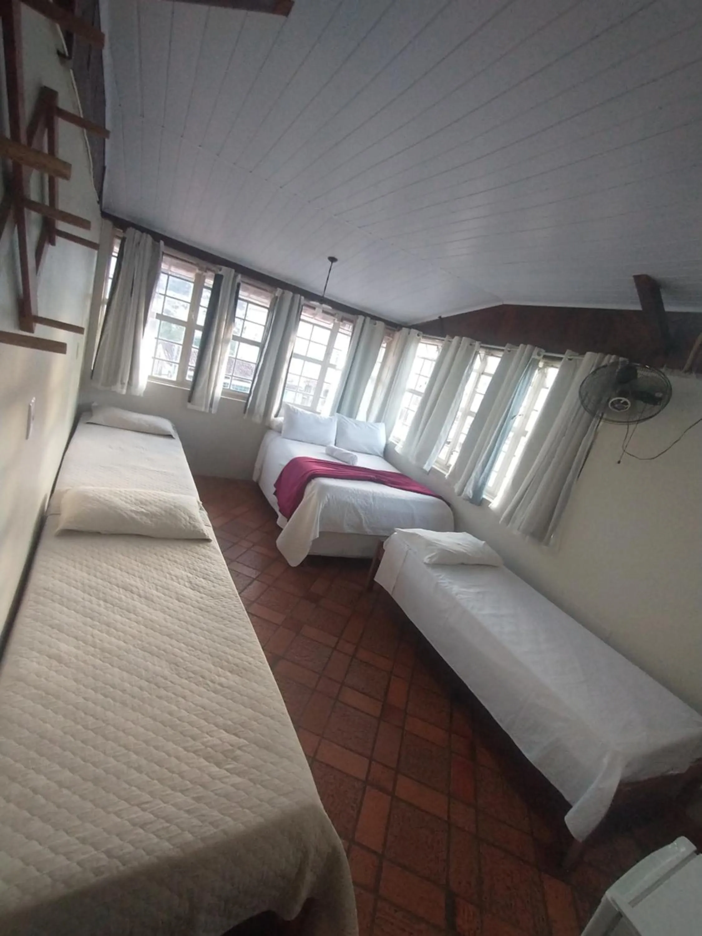 Bed in Pousada Acayaca