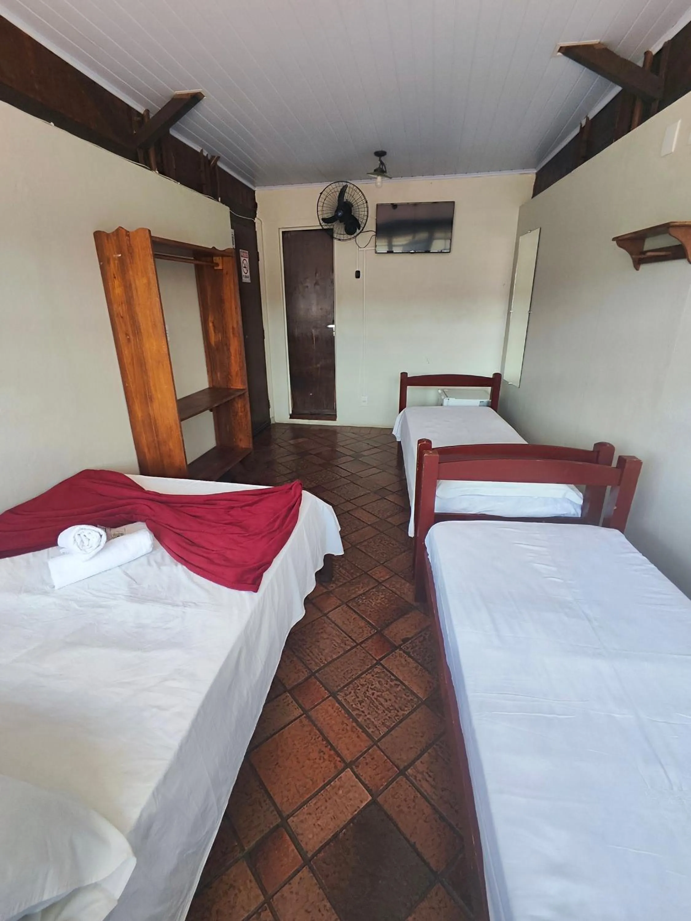 Bed in Pousada Acayaca