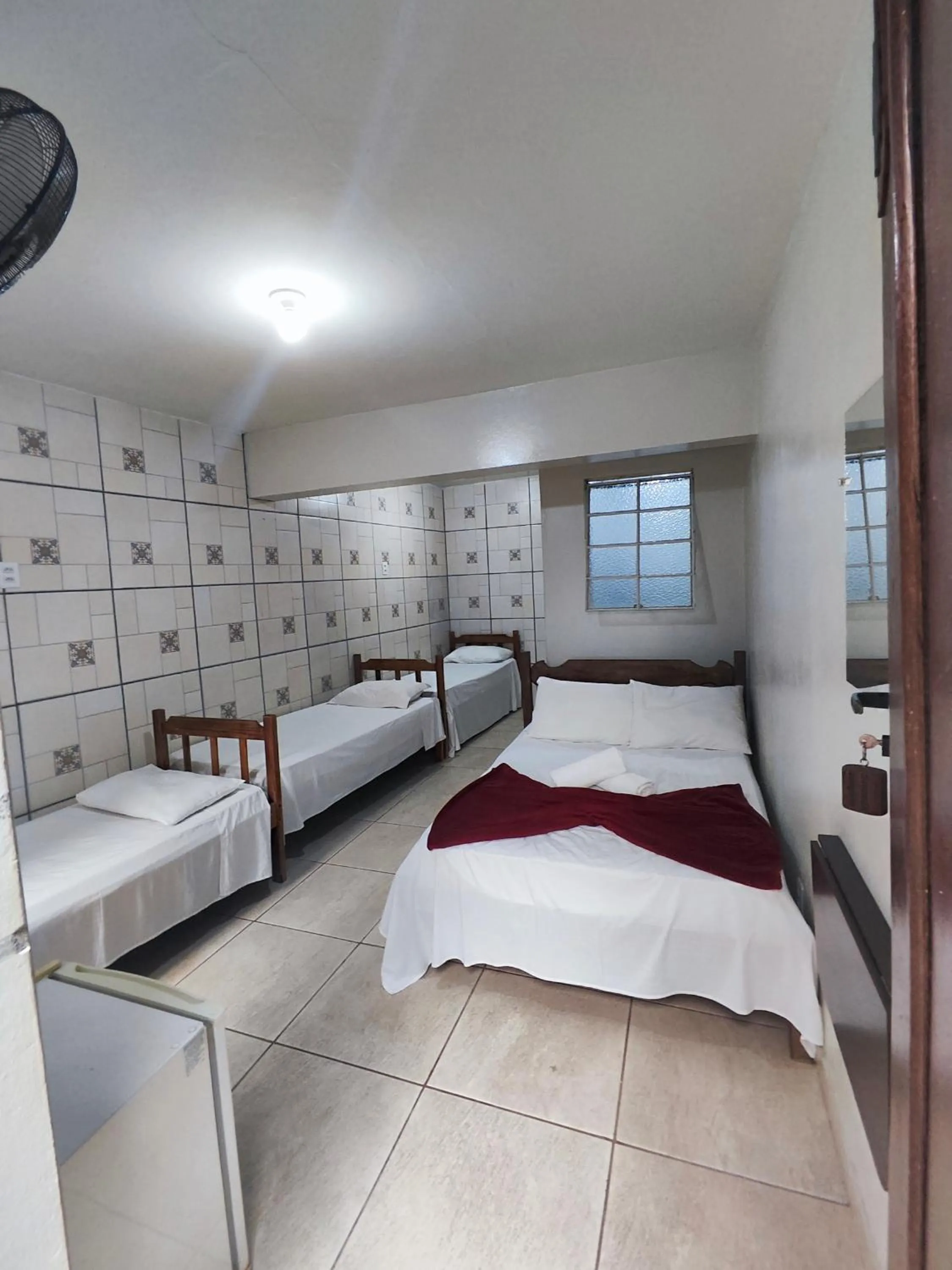 Bed in Pousada Acayaca