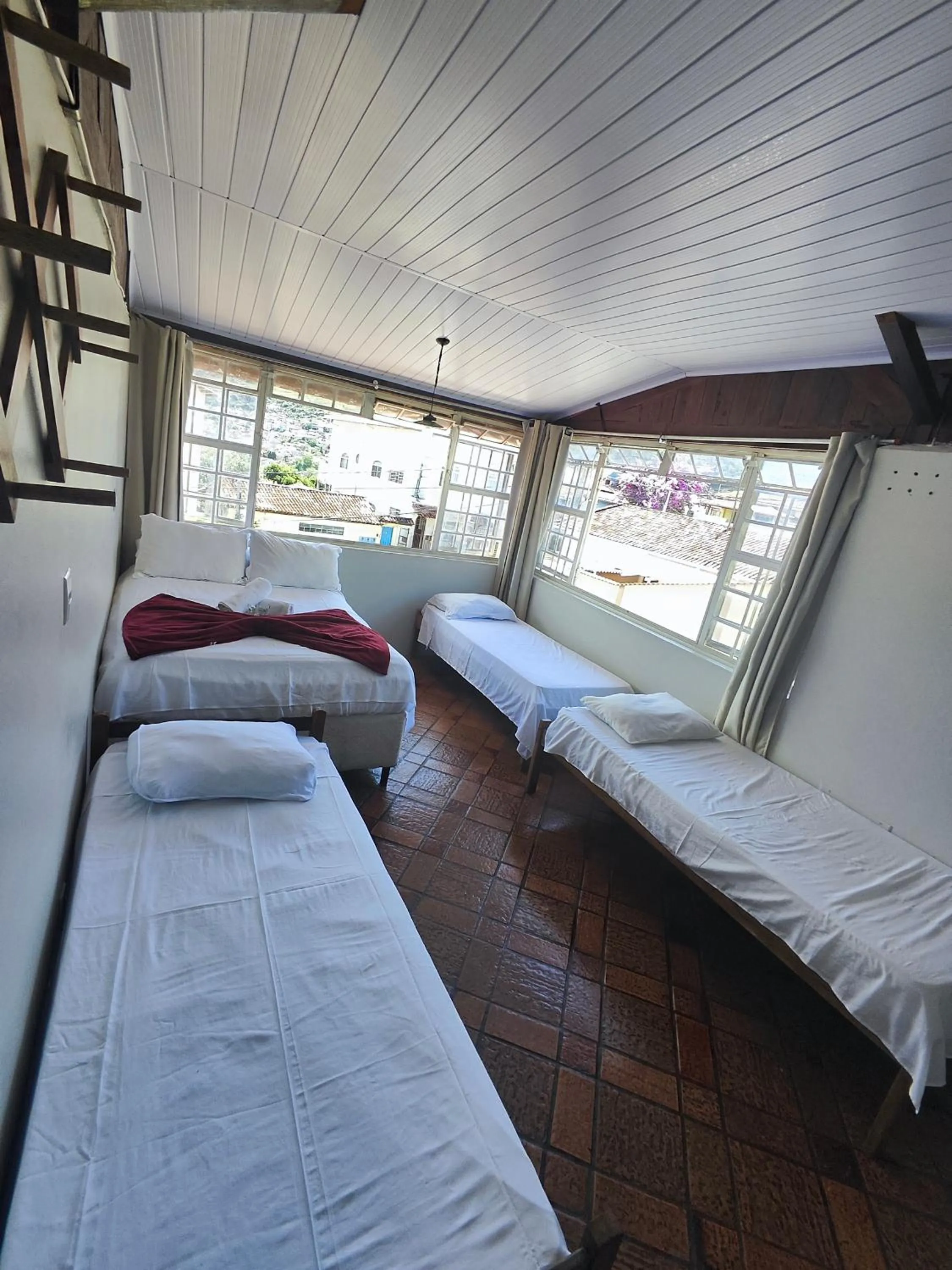 Bed in Pousada Acayaca