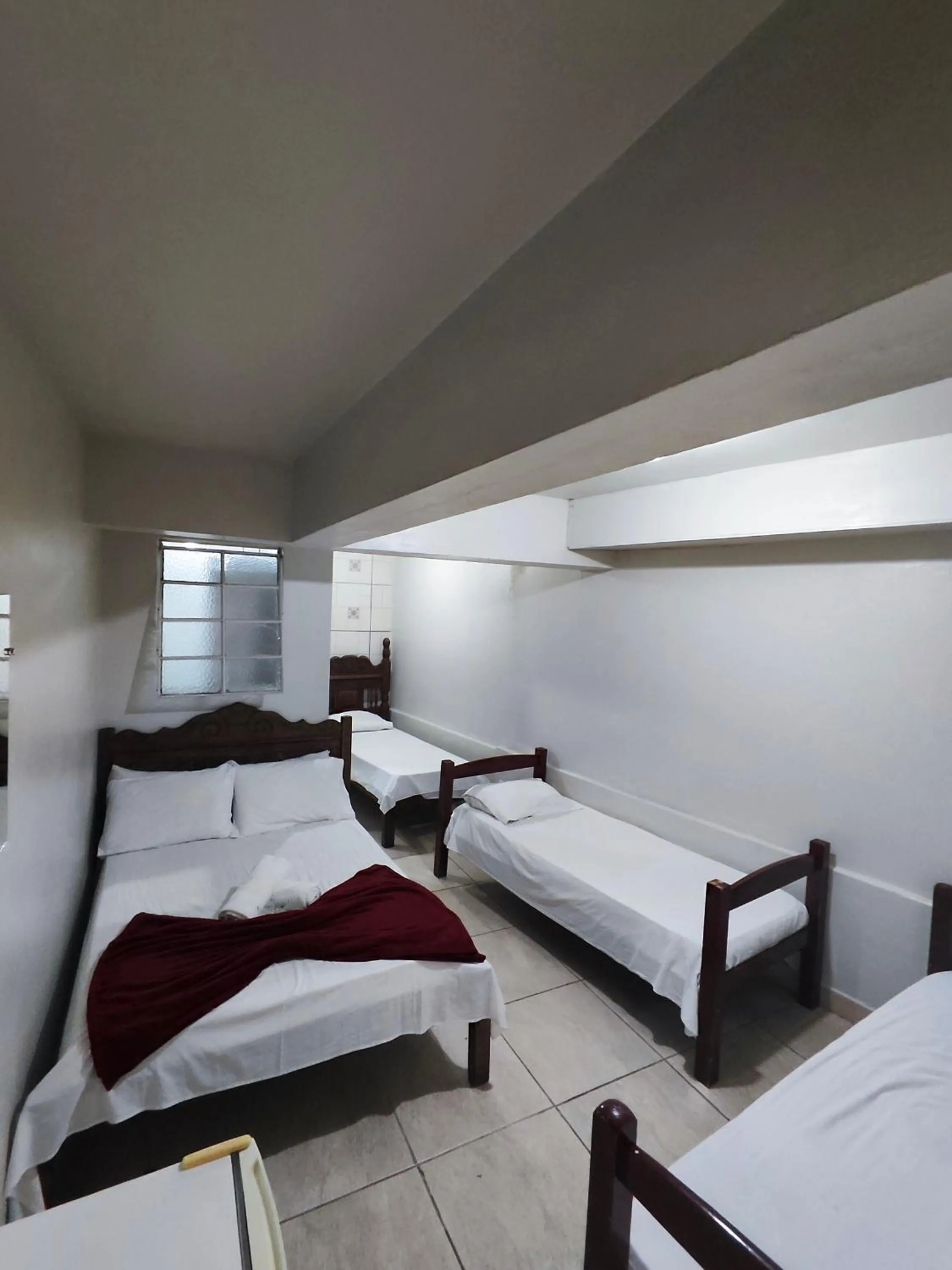 Bed in Pousada Acayaca