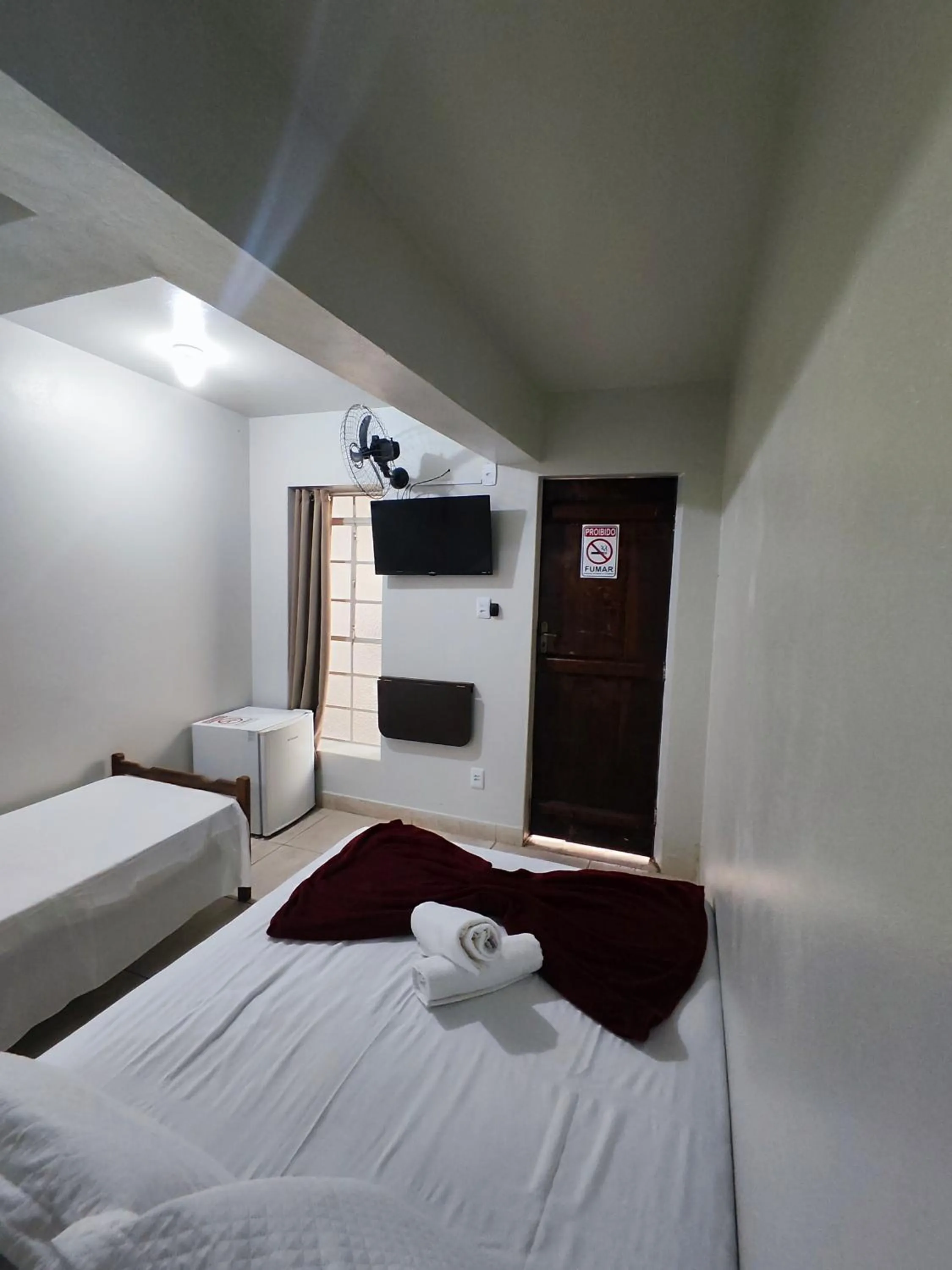 Bed in Pousada Acayaca