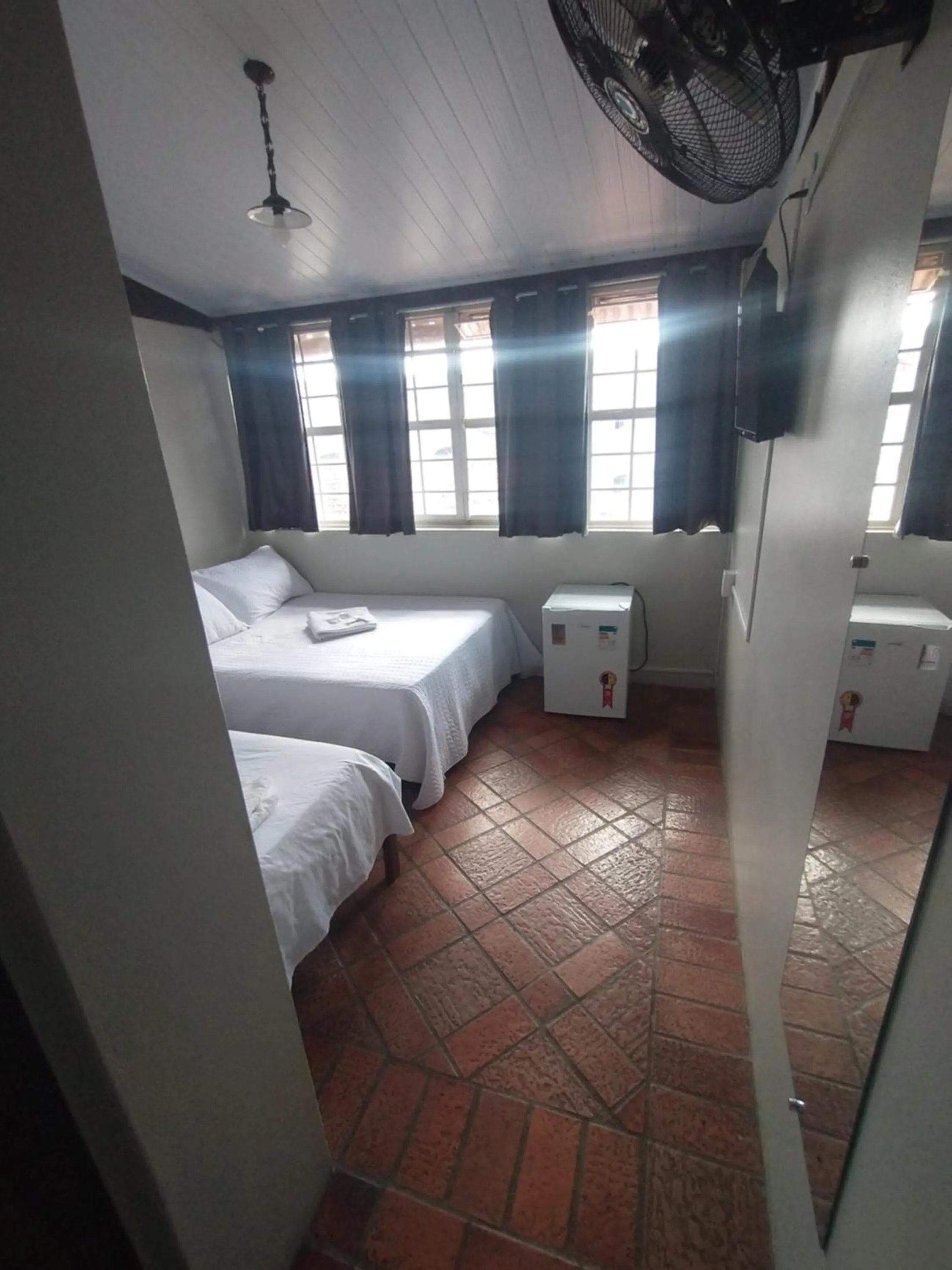 Bed in Pousada Acayaca