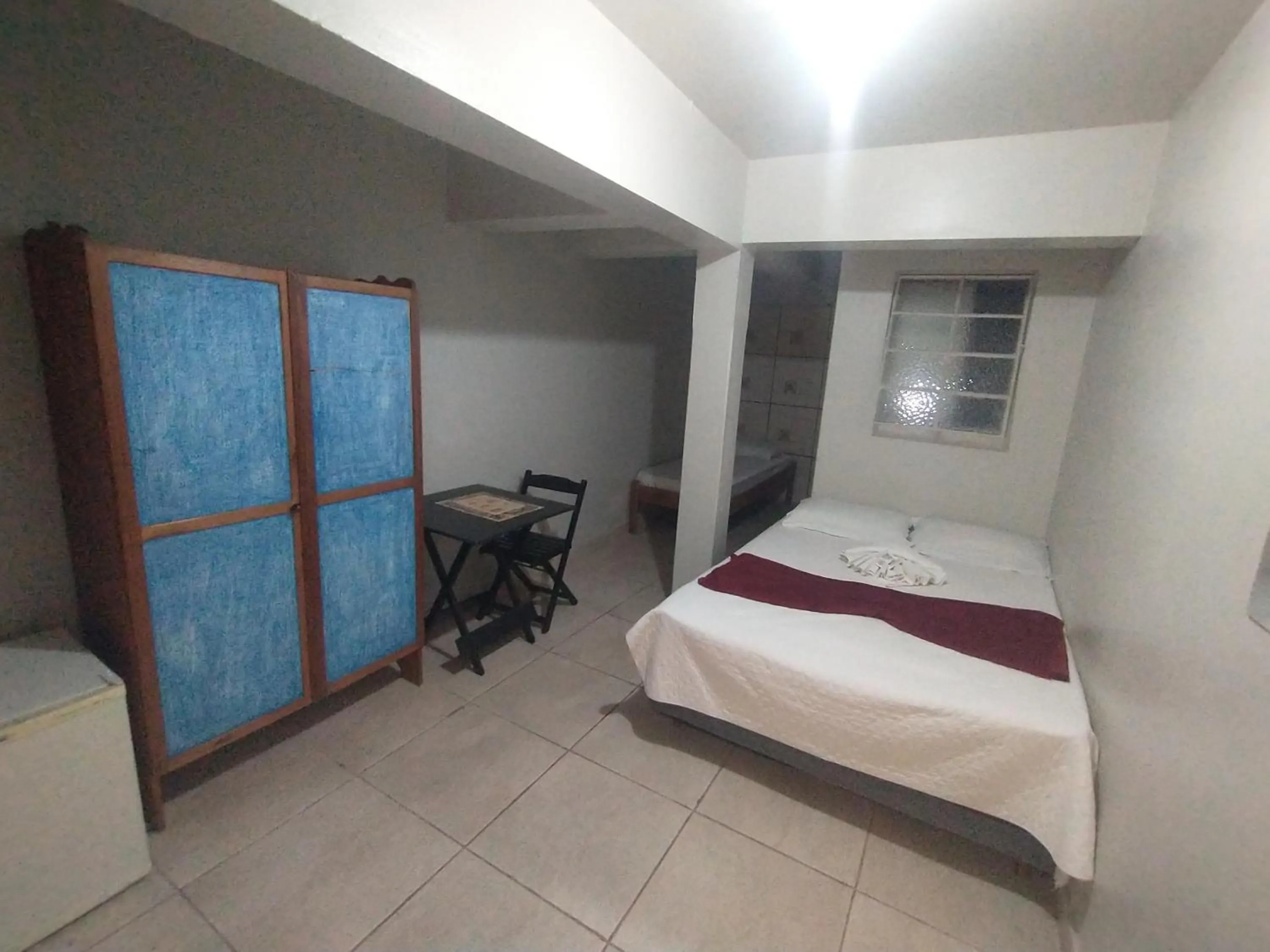 Bed in Pousada Acayaca