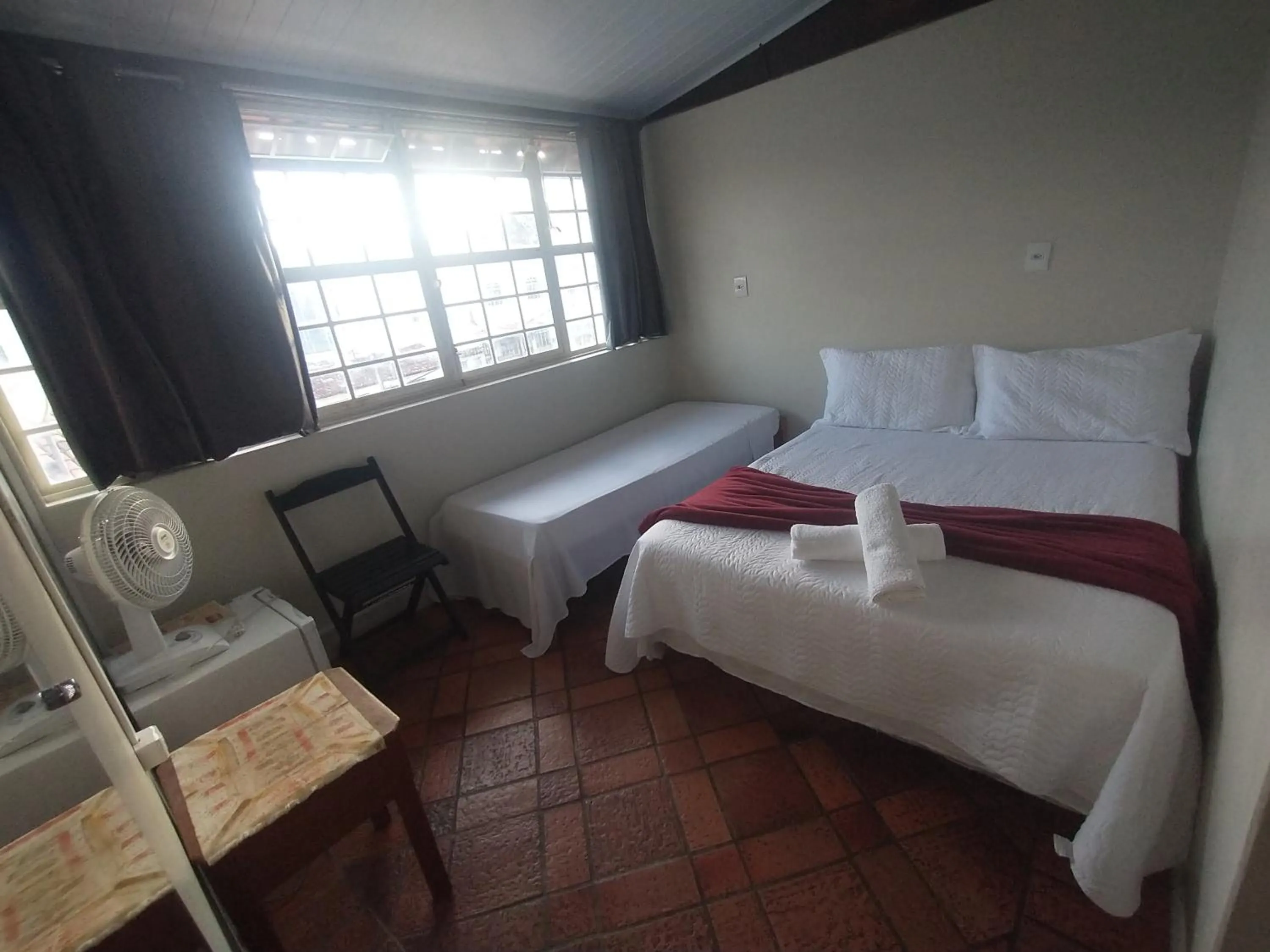 Bed in Pousada Acayaca