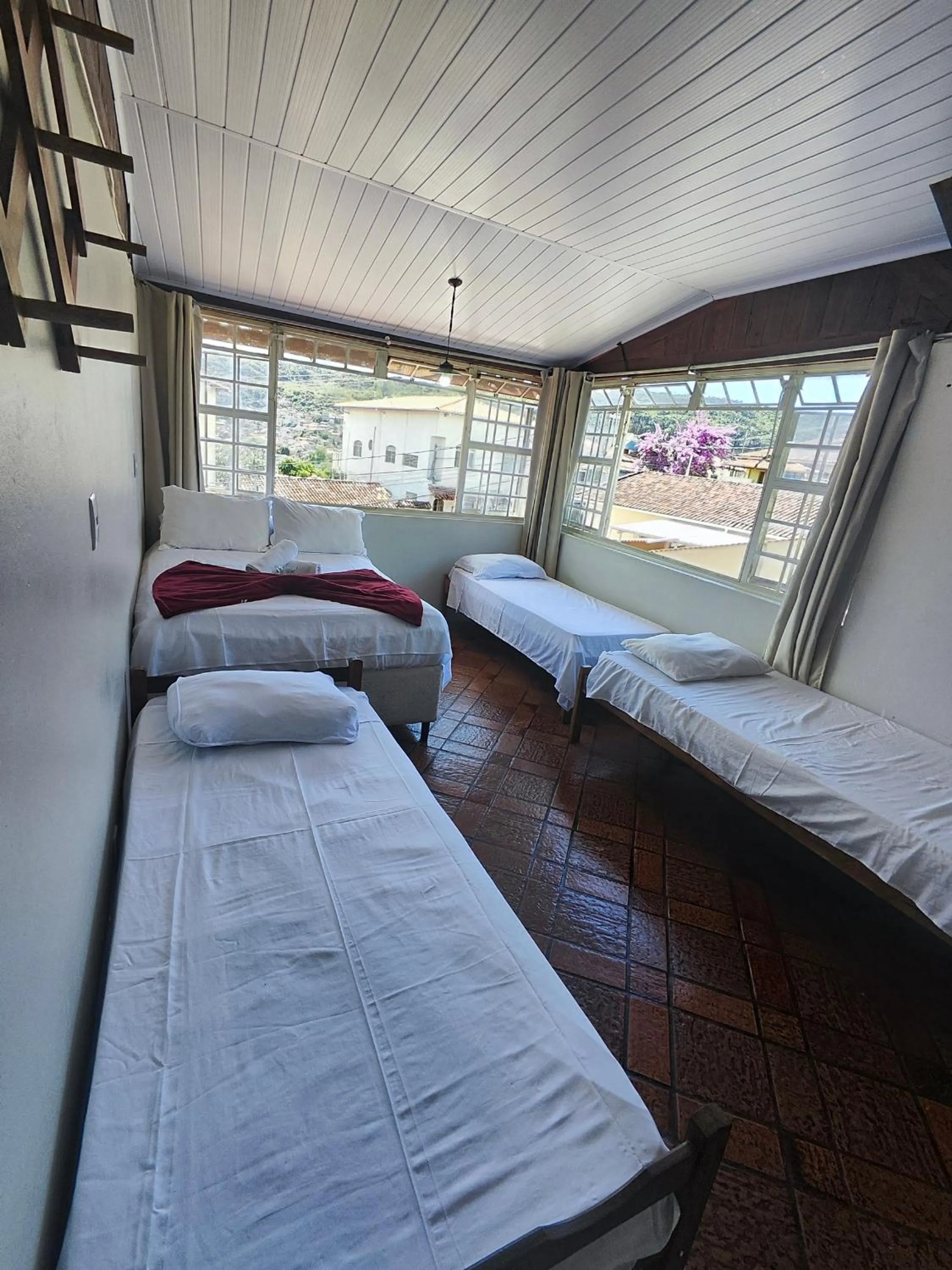 Bed in Pousada Acayaca