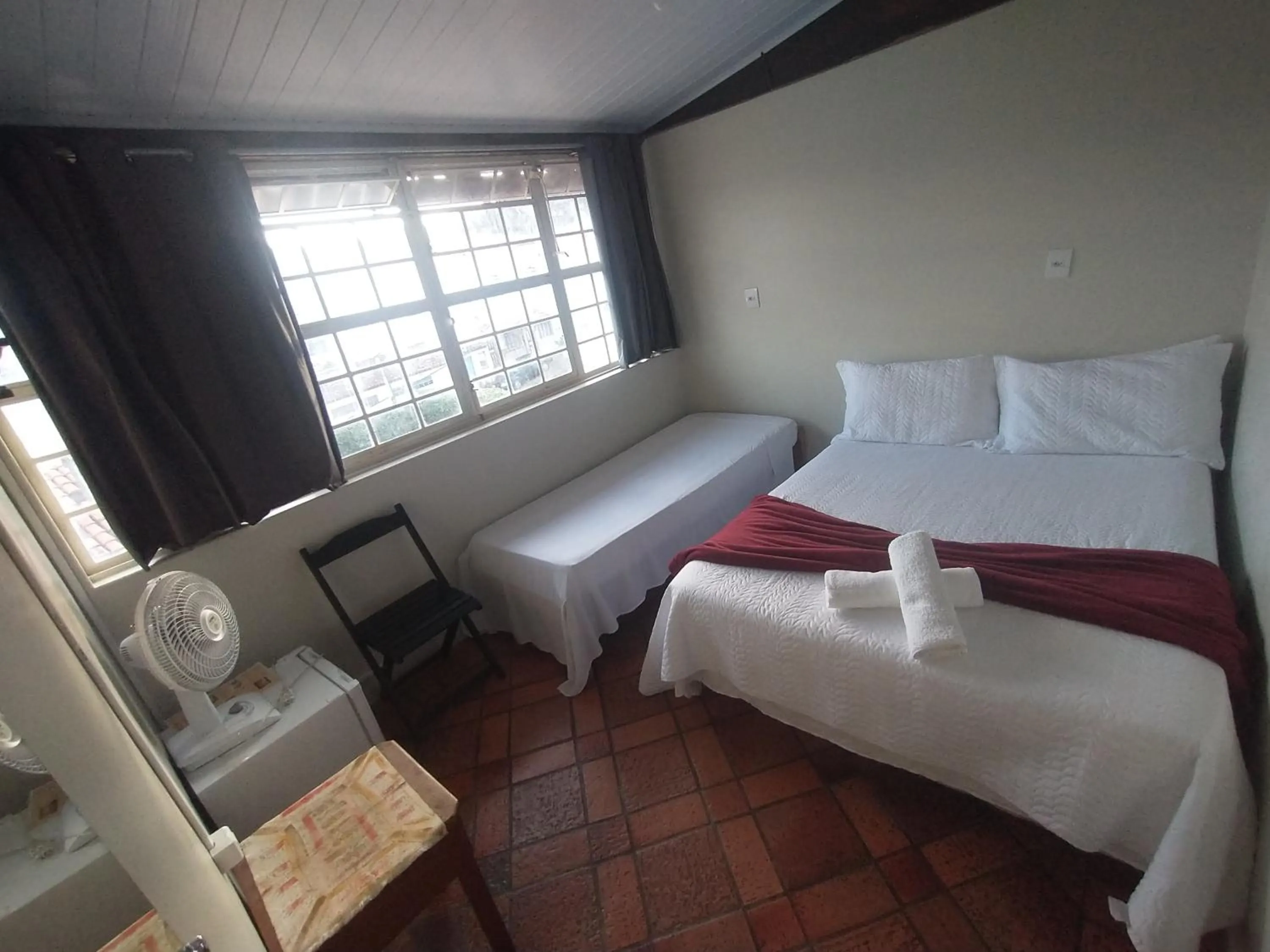 Bed in Pousada Acayaca