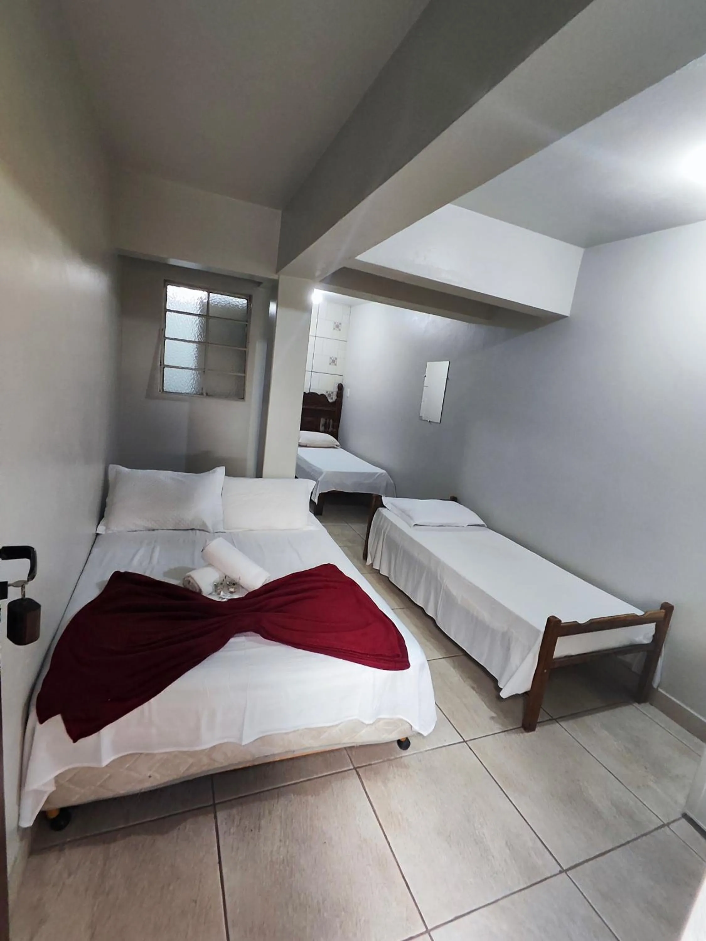 Bed in Pousada Acayaca