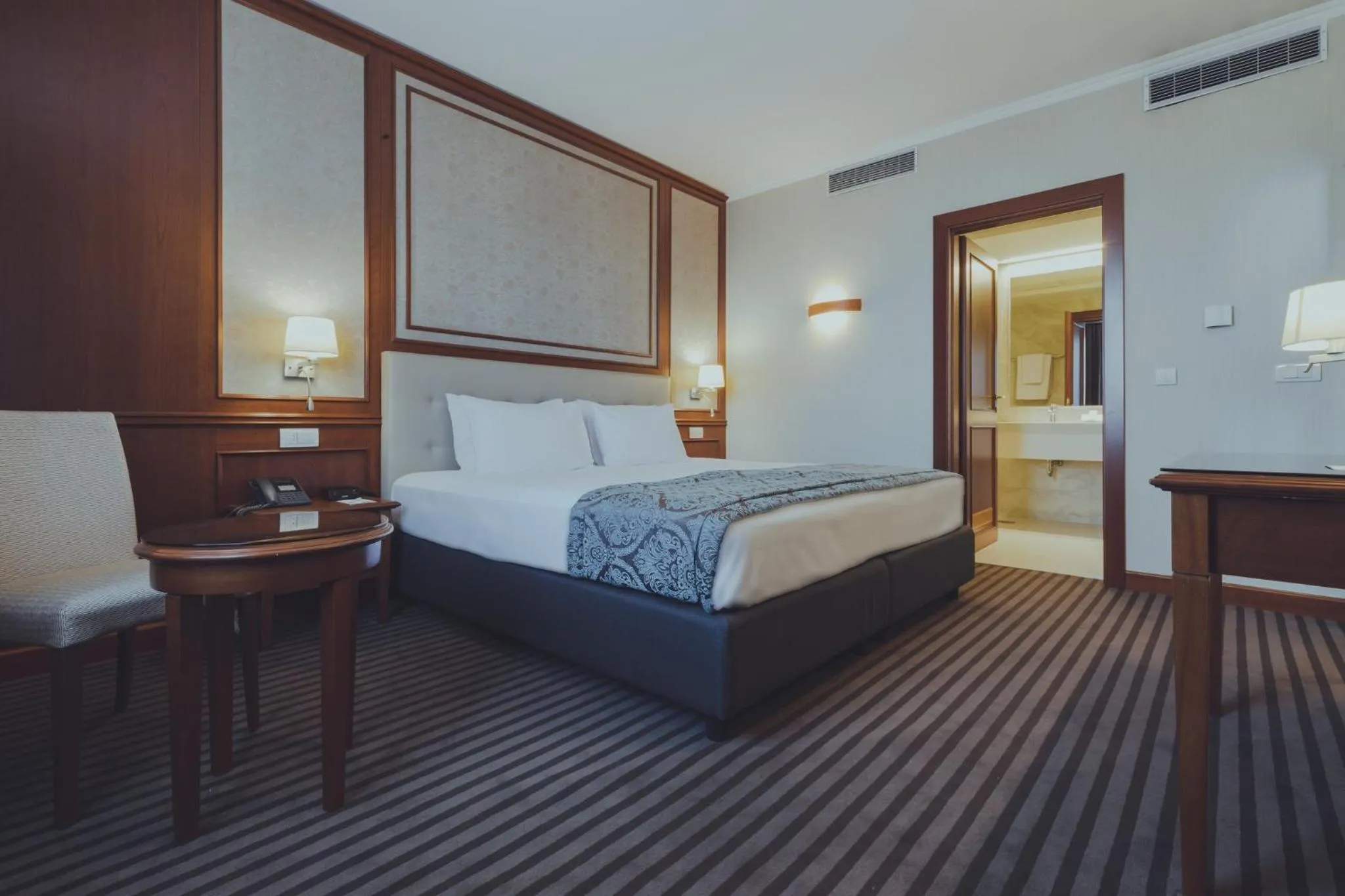 Photo of the whole room, Bed in Holiday Inn Skopje by IHG